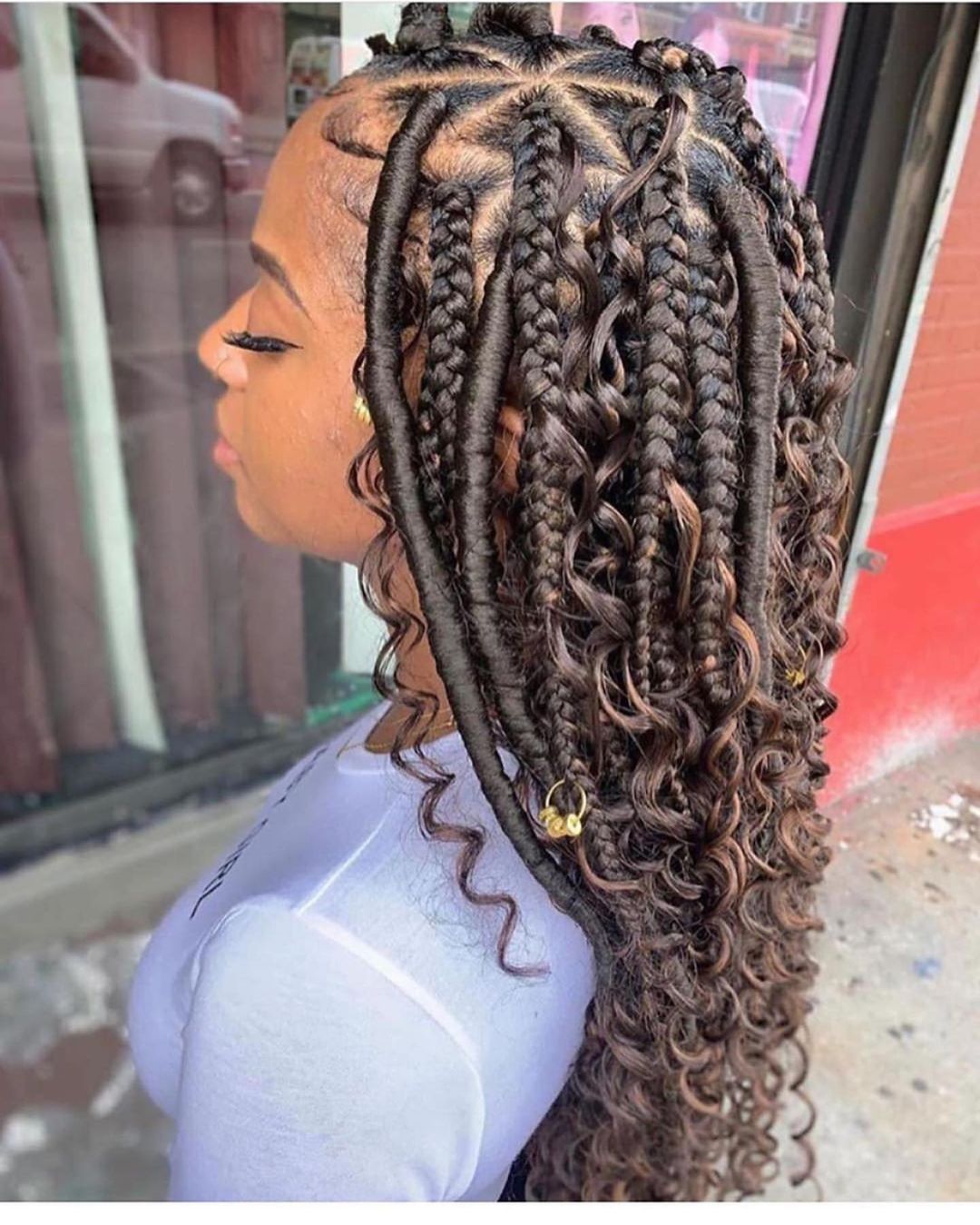 Mixture Of Knotless Braid With Curls