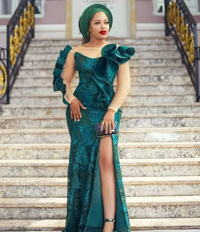 2022 Latest Owambe Lace Gown Styles for Ladies. - Ladeey