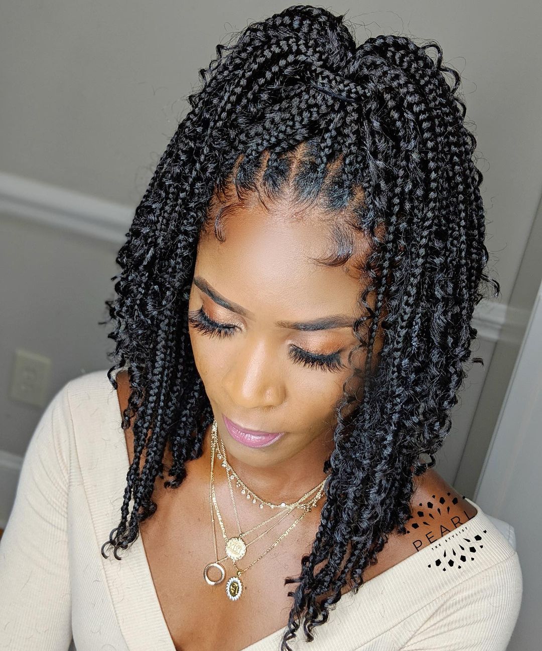 Knotless braids with loose curls