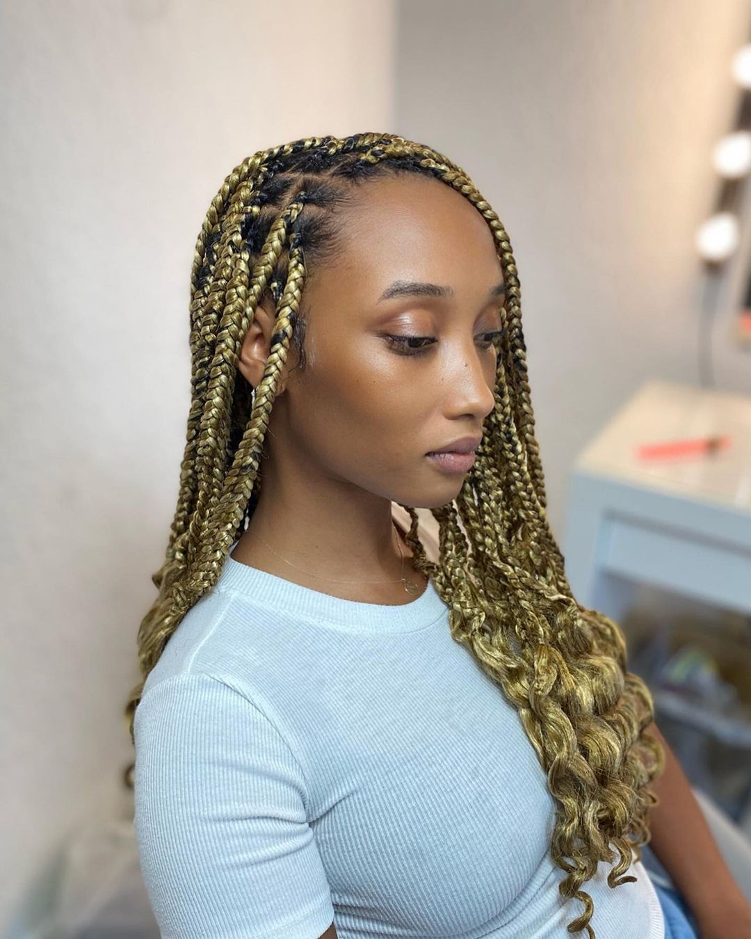 Blonde Knotless Braids With Curls