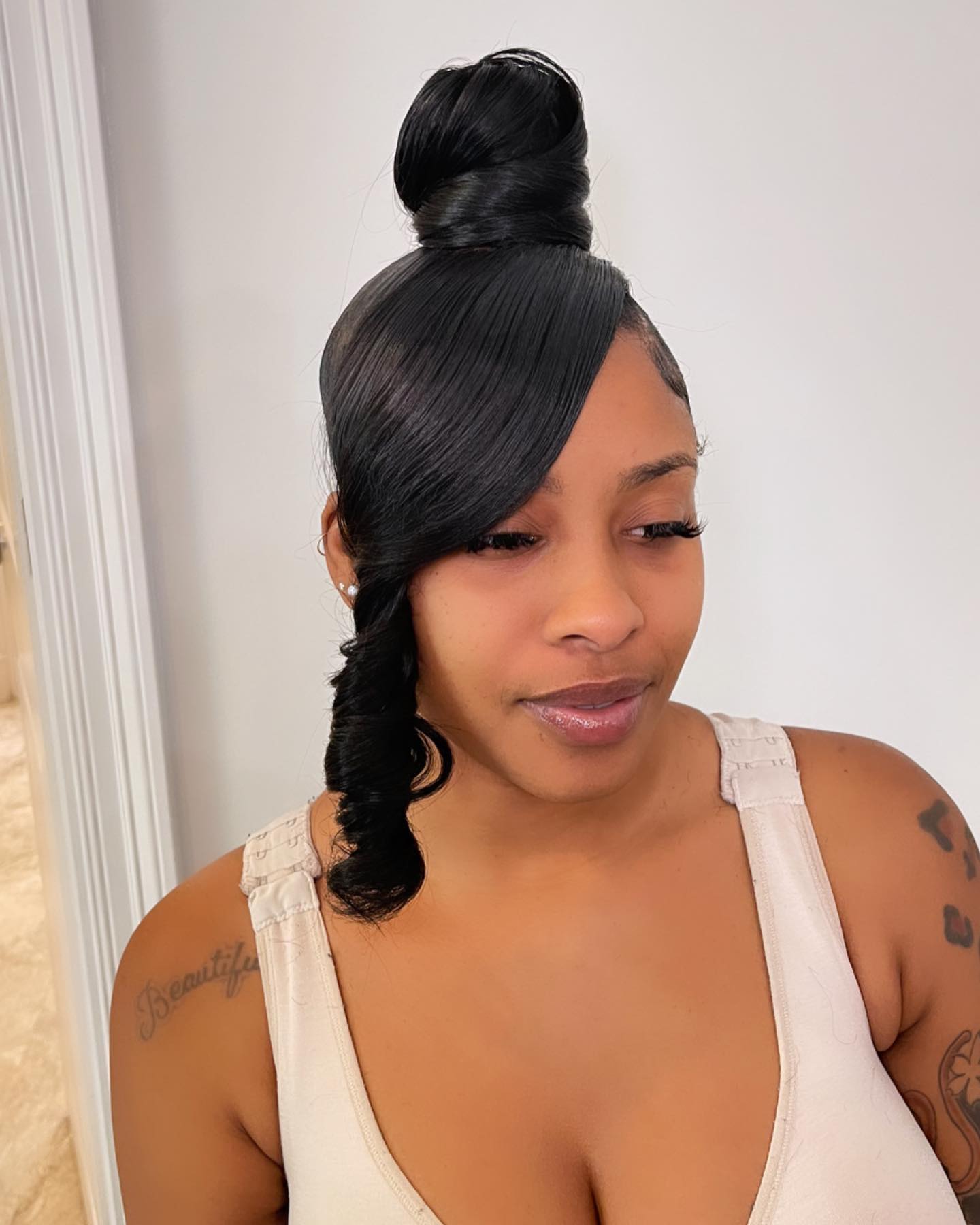 Bun With Side Spiral Fringe