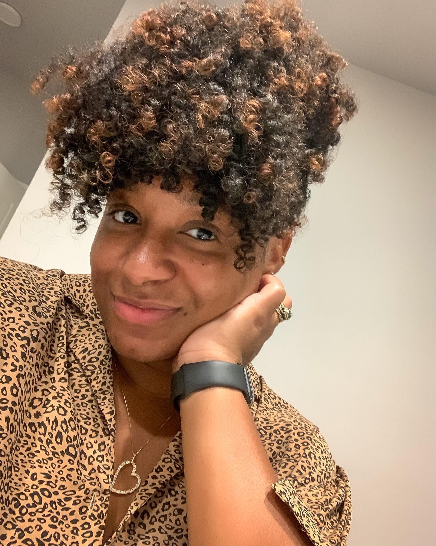 High Bun Puff With Coil Bangs