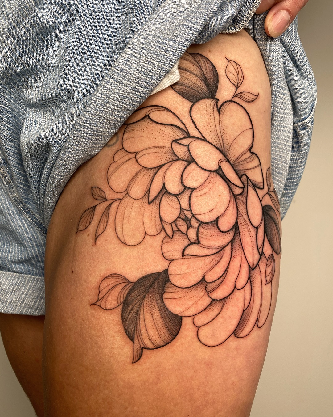 Classic Flower Hip Tattoo