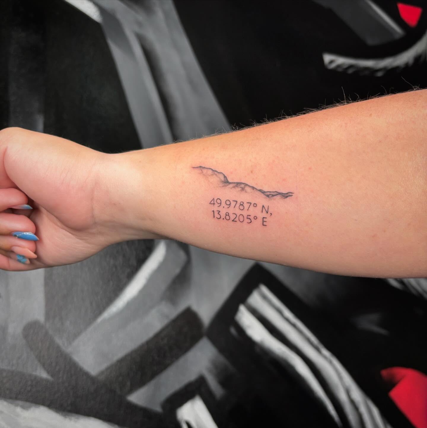 Coordinates And Mountain Outline Tattoo