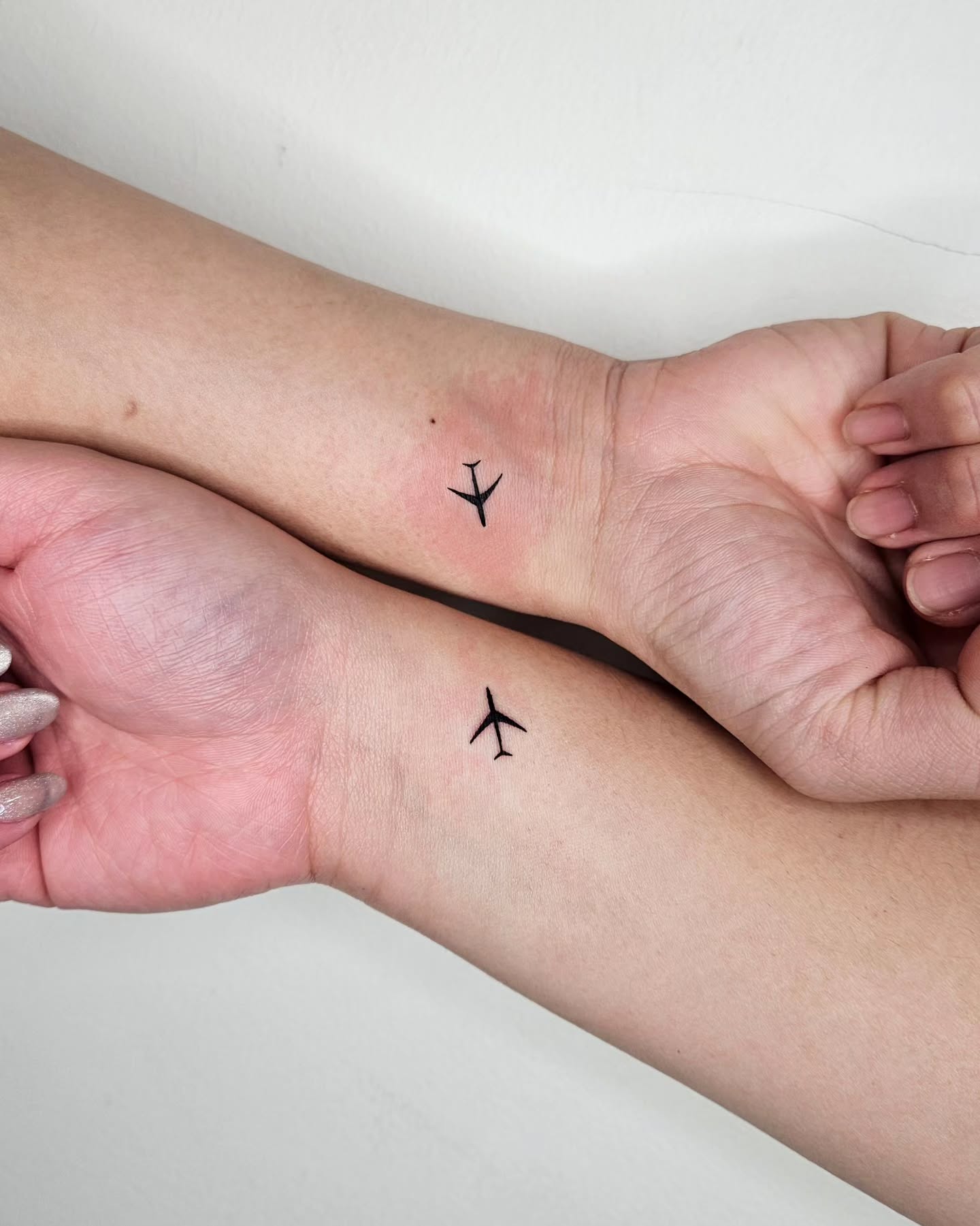 Small Airplane Wrist Tattoo