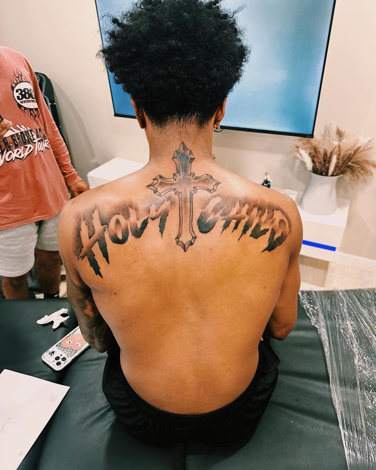 Holy Child Upper Back Tattoo