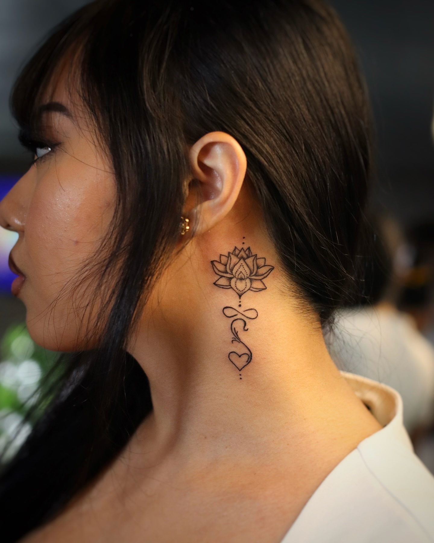 Small Crispy Neck Tattoo