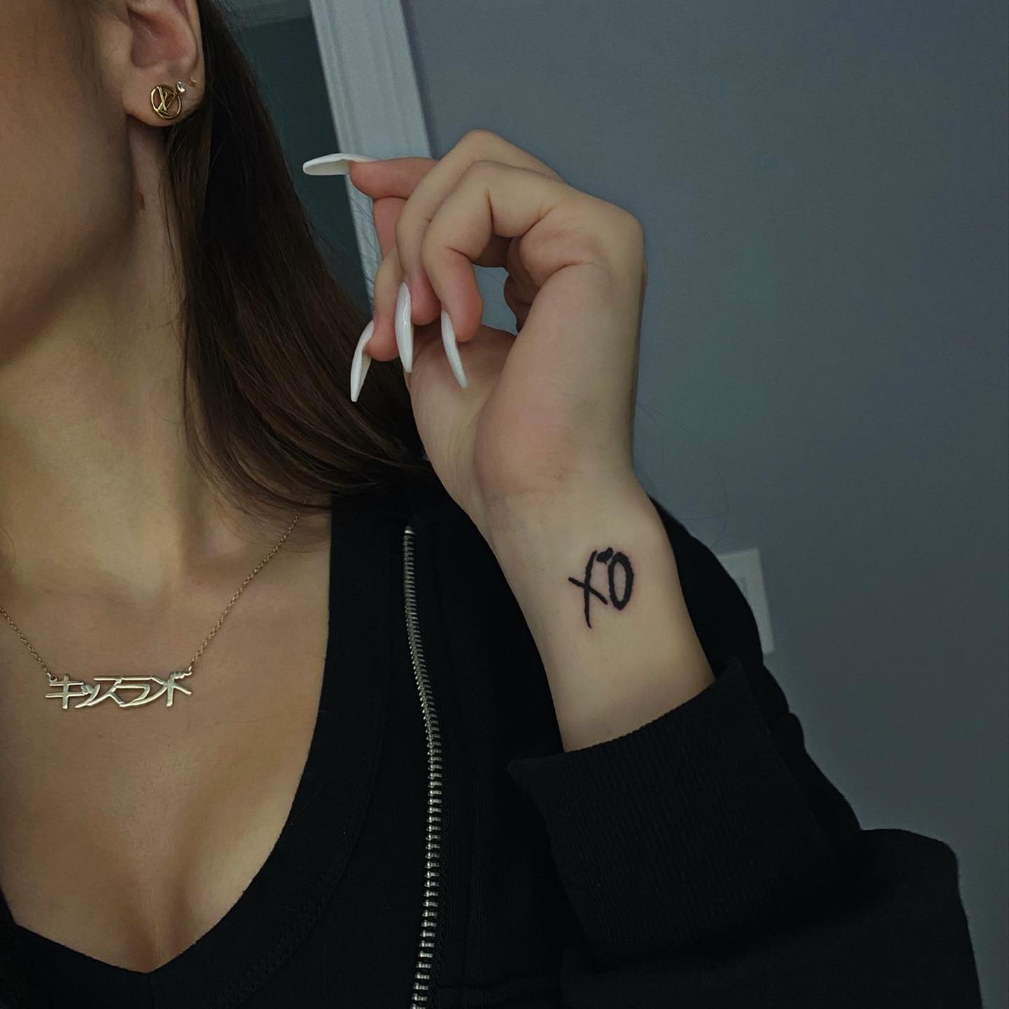 The Cute XO Side Wrist Tattoo