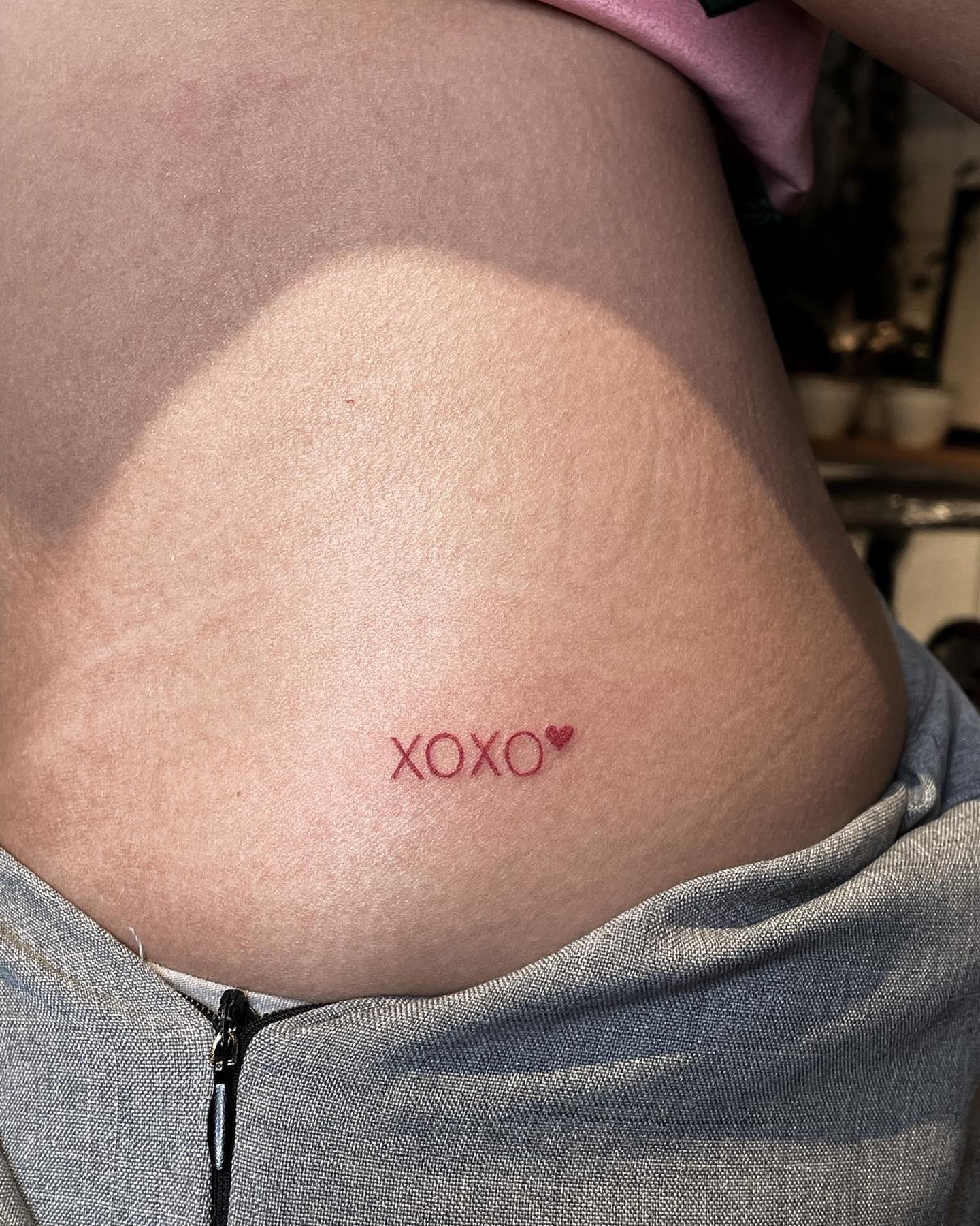 Sassy XO Hip Tattoo