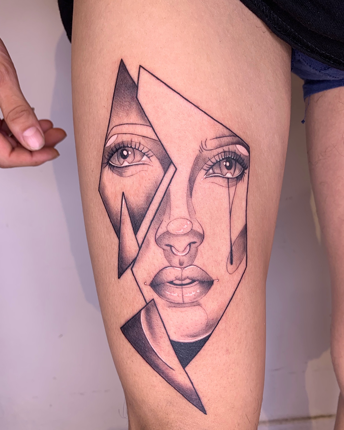 Broken Mirror Symbol Tattoo