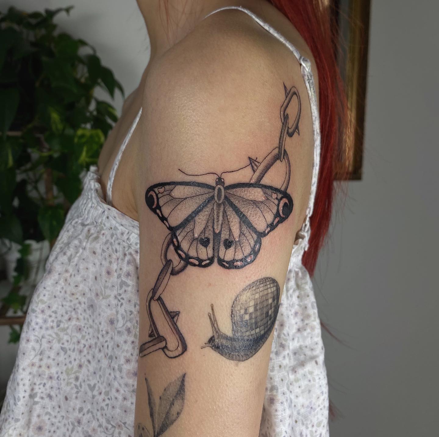 Butterfly with broken chain