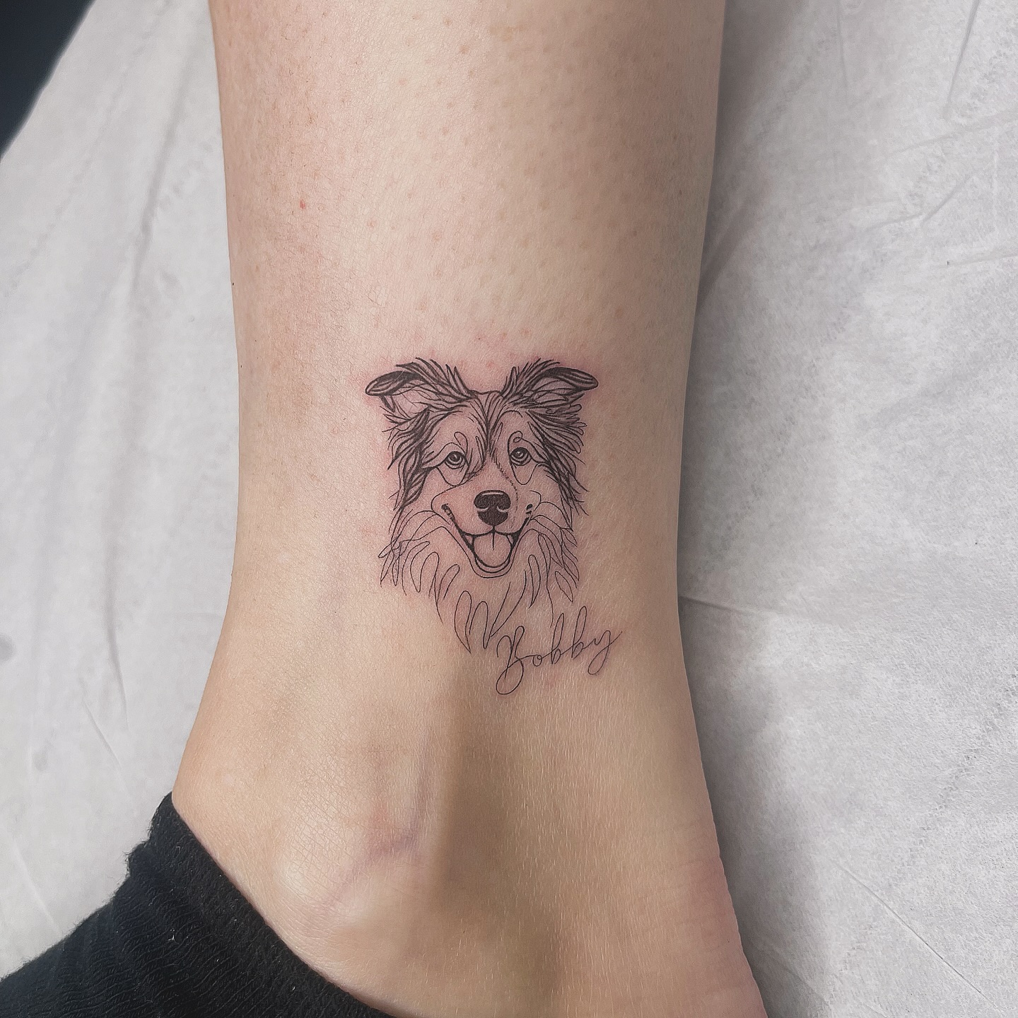 Single Needle Dog Tattoo