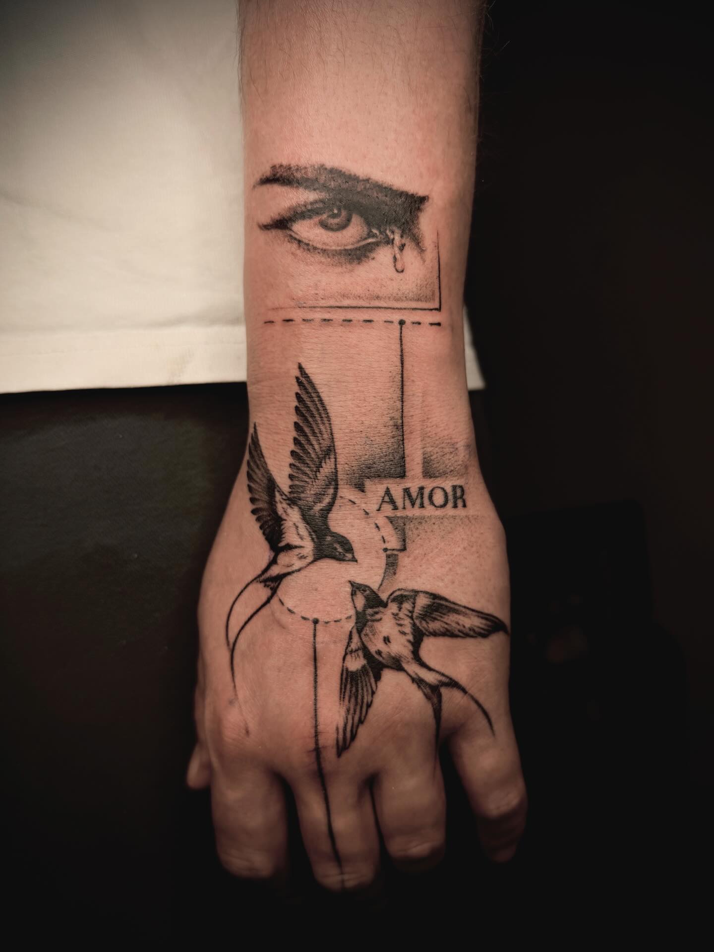 Small Outline Wrist Tattoo