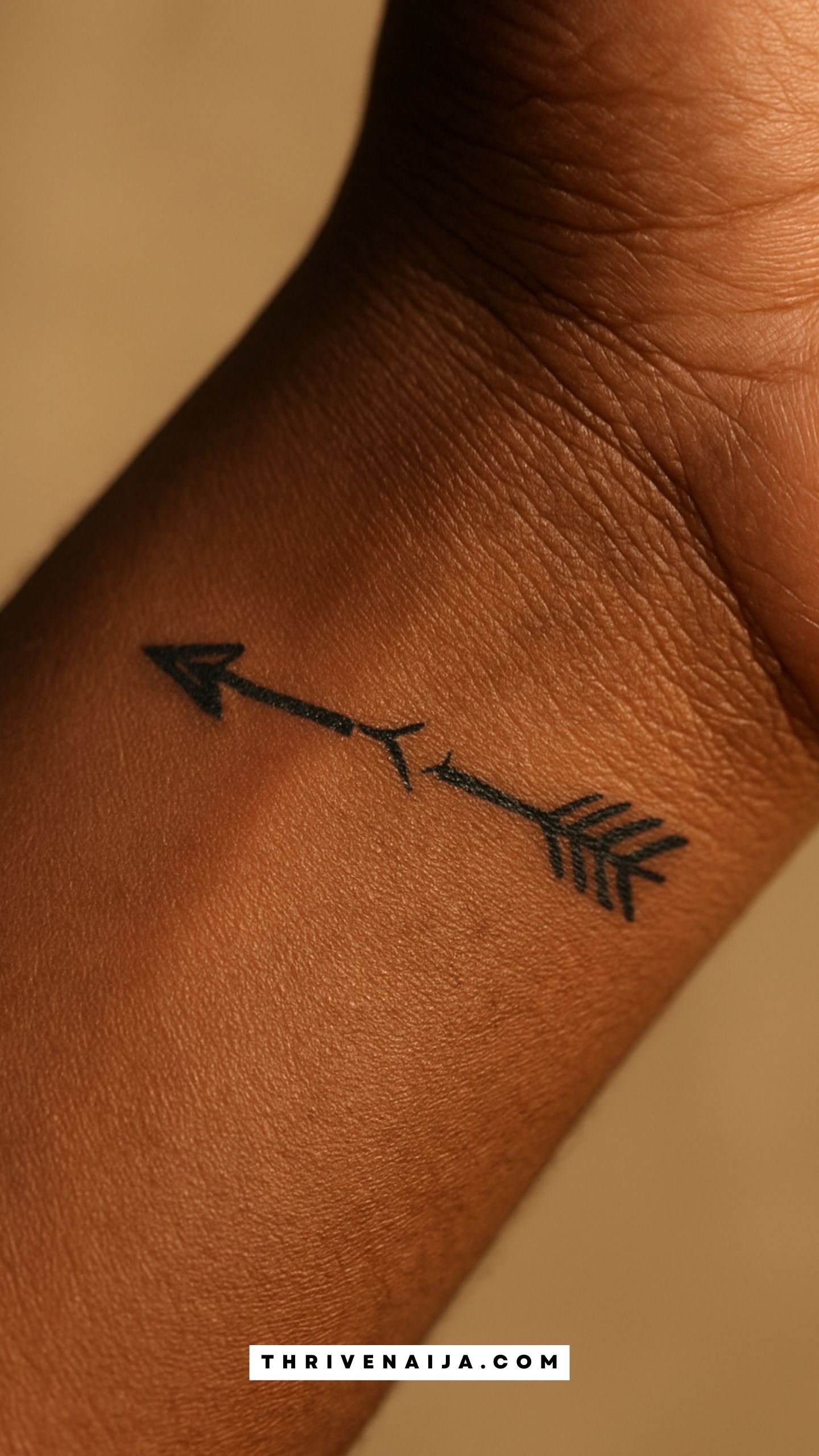 Broken Arrow Wrist Tattoo