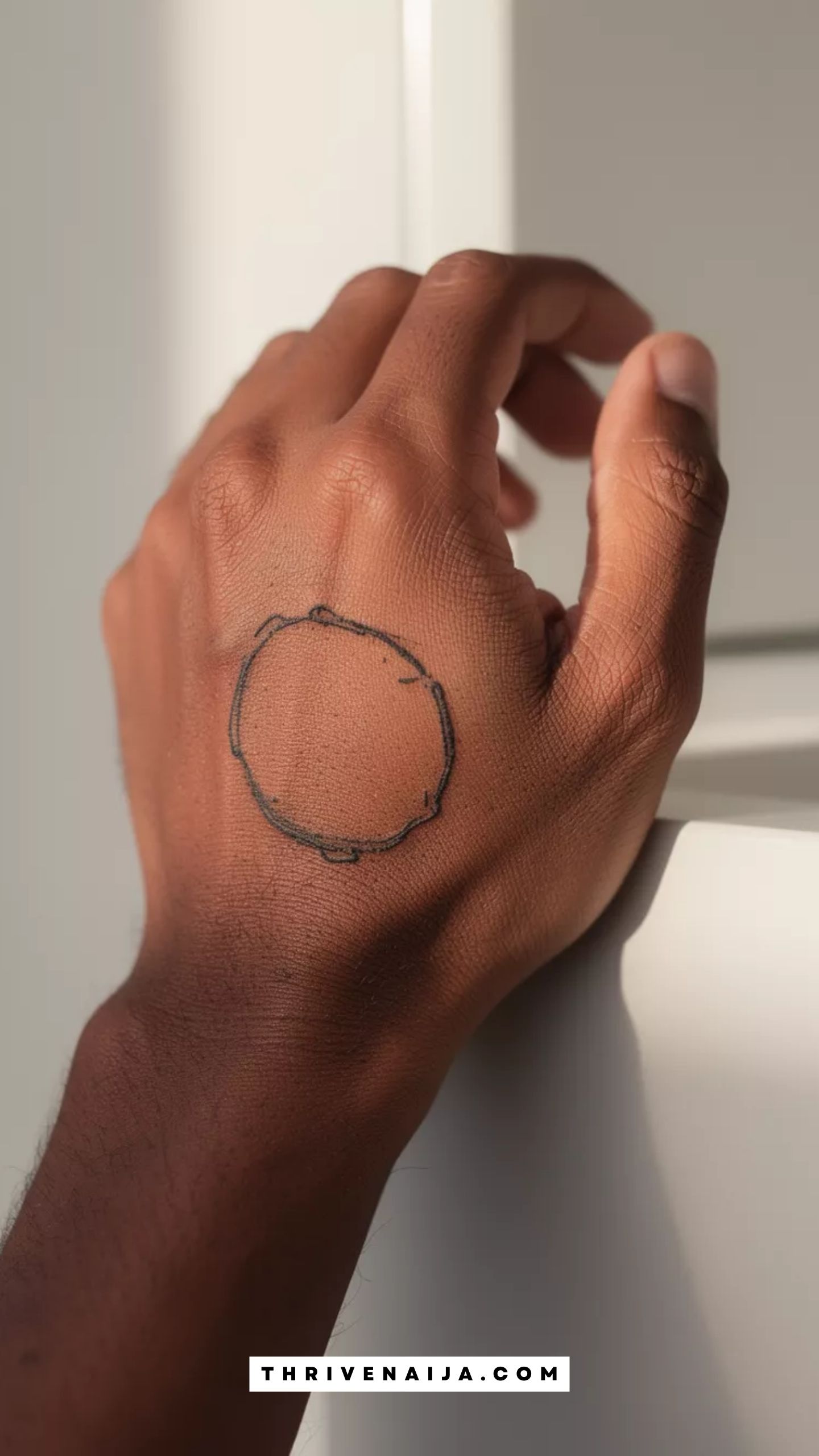 Circle With Imperfect Line Hand Tattoo