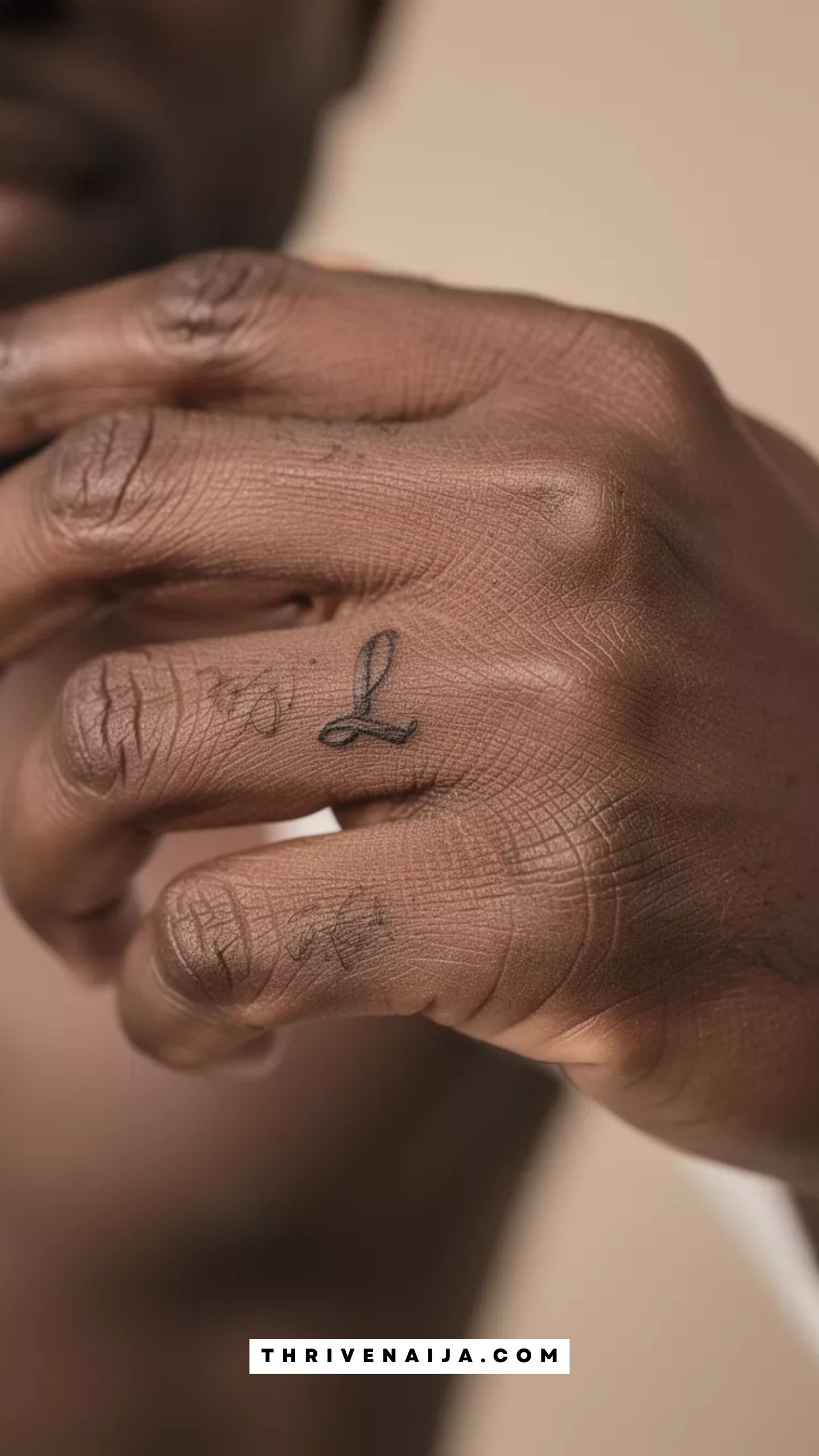 Death Note “L” Symbol Finger Tattoo