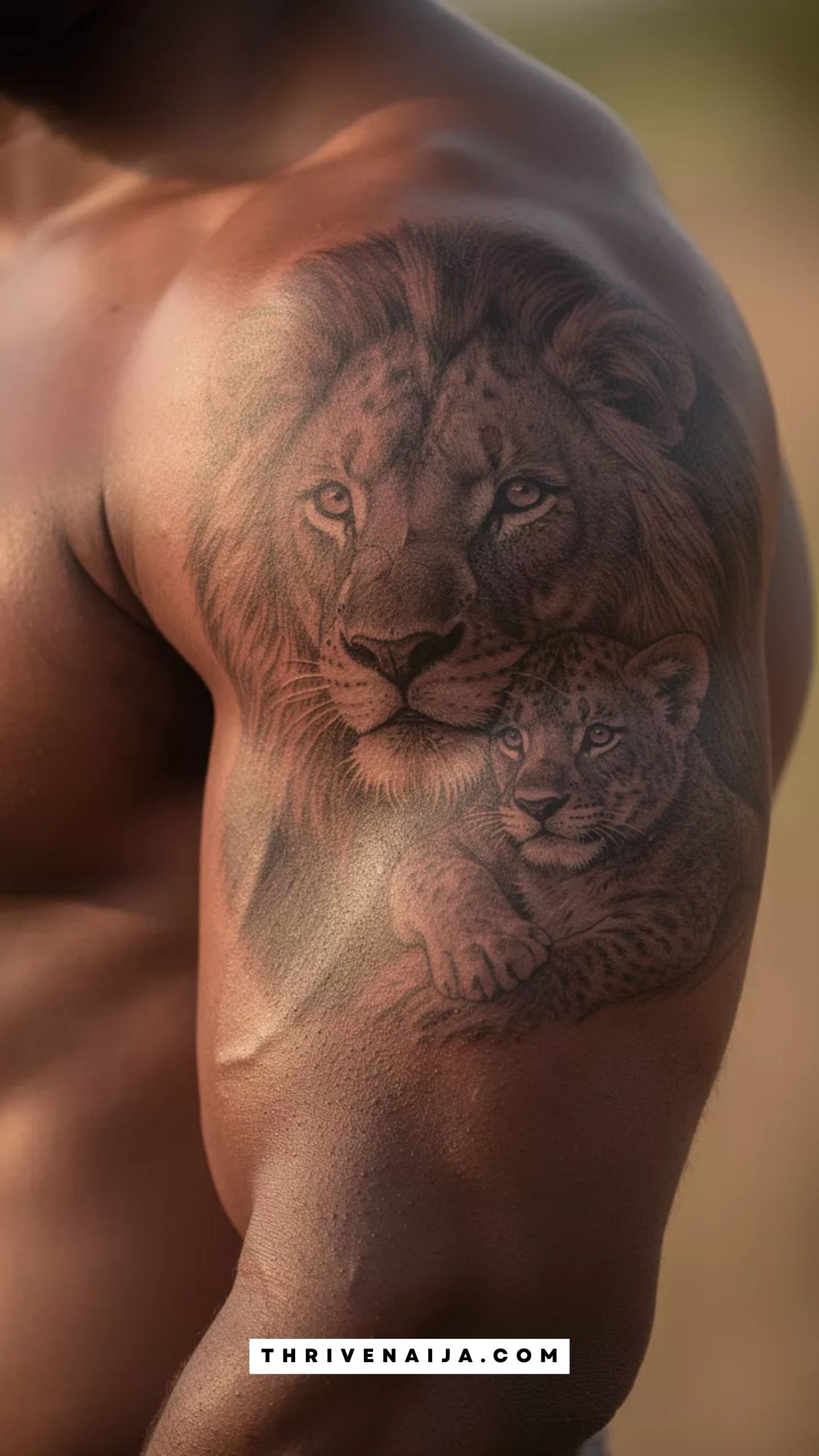 Lion and Cub Upper Arm Tattoo