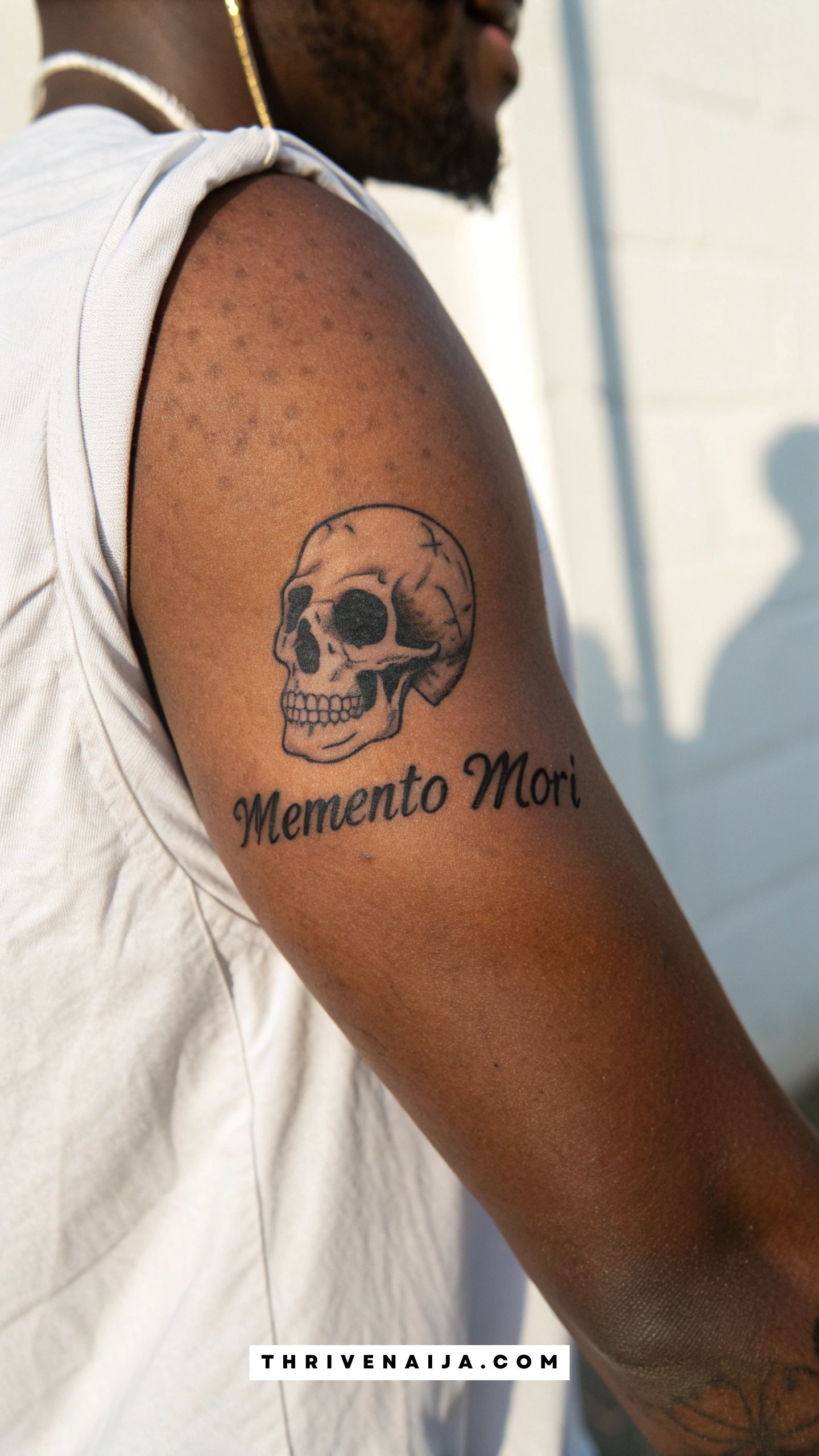 “Memento Mori” Forearm Tattoo