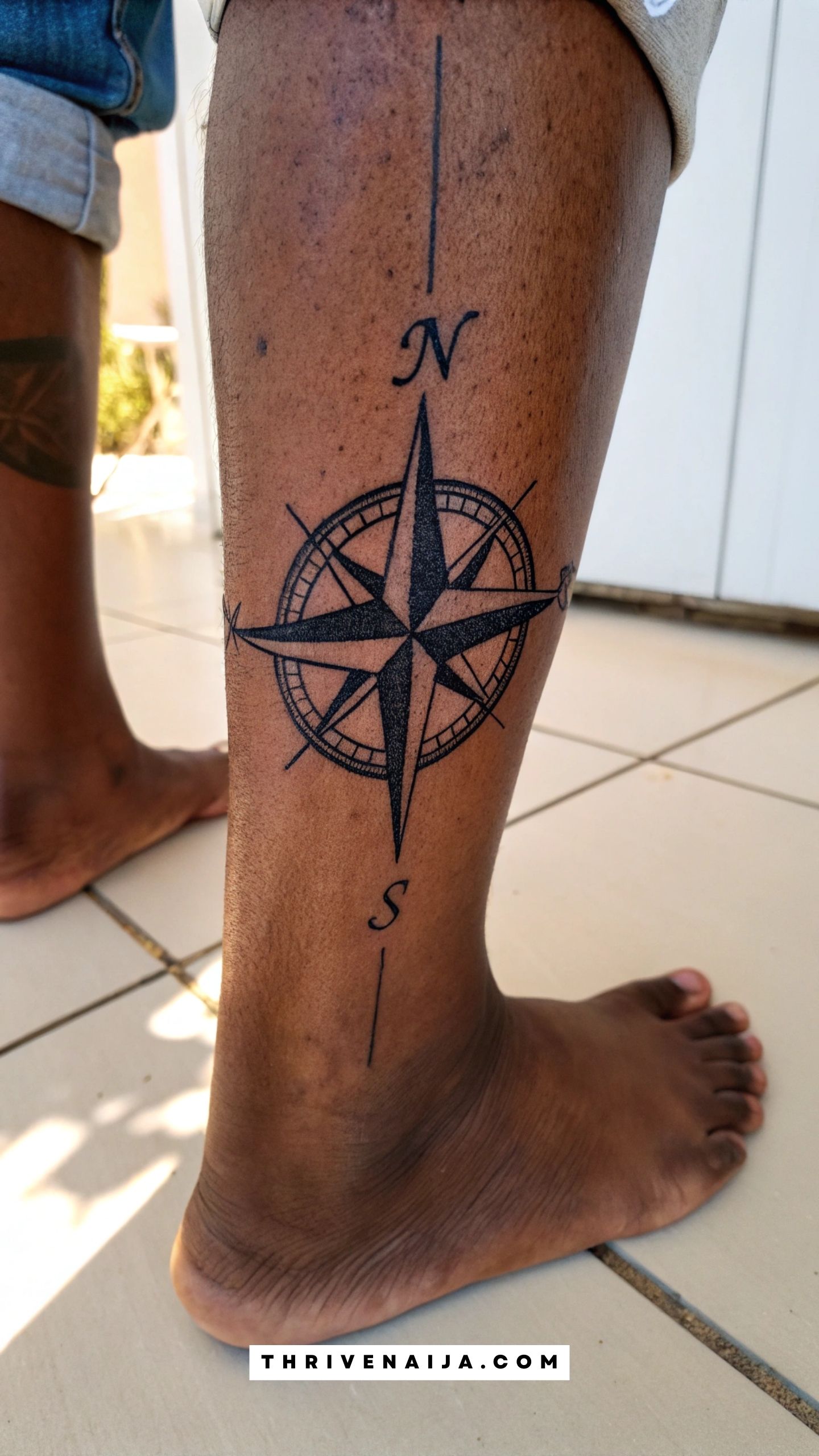 Minimal Compass Needle Ankle Tattoo