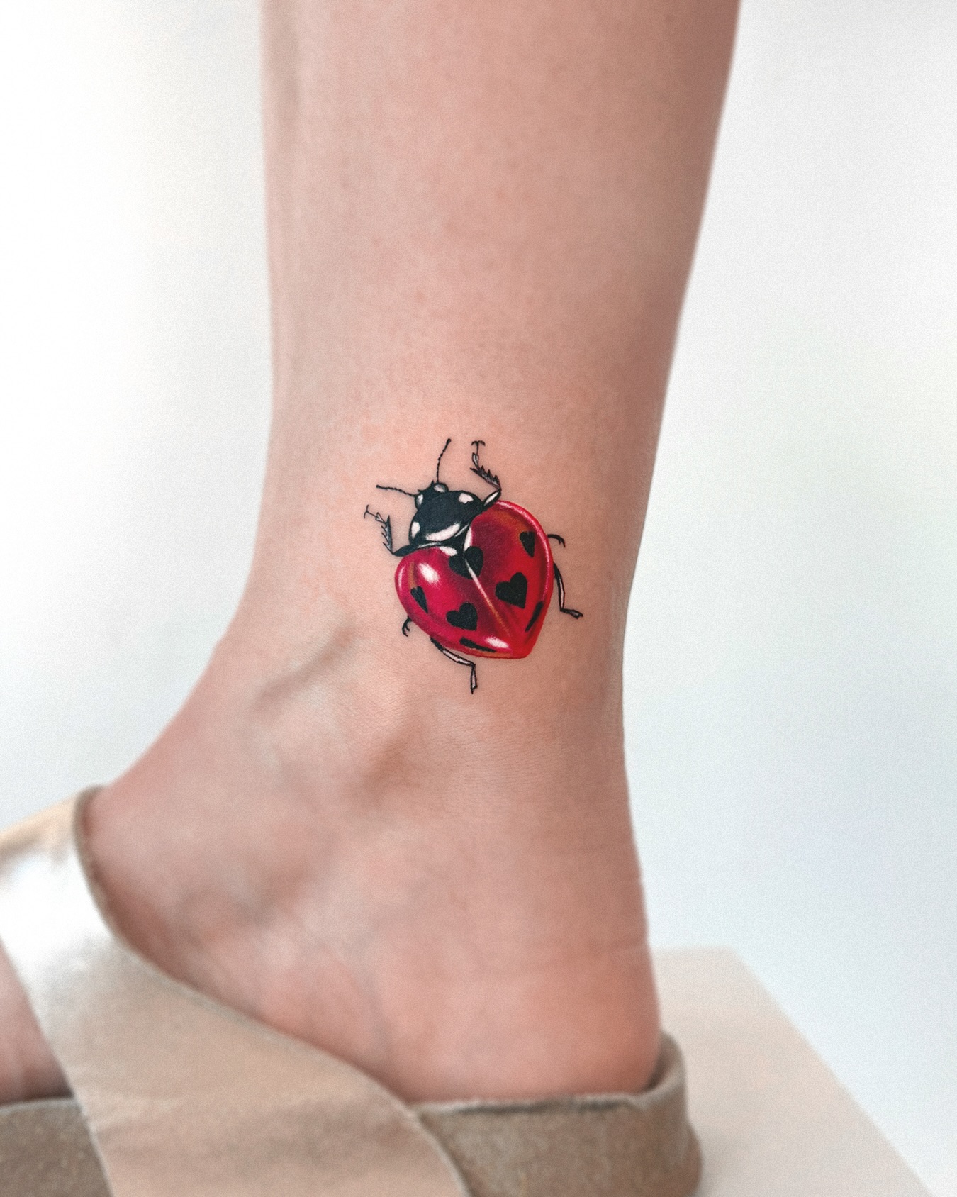 Long Bug Ankle Tattoo