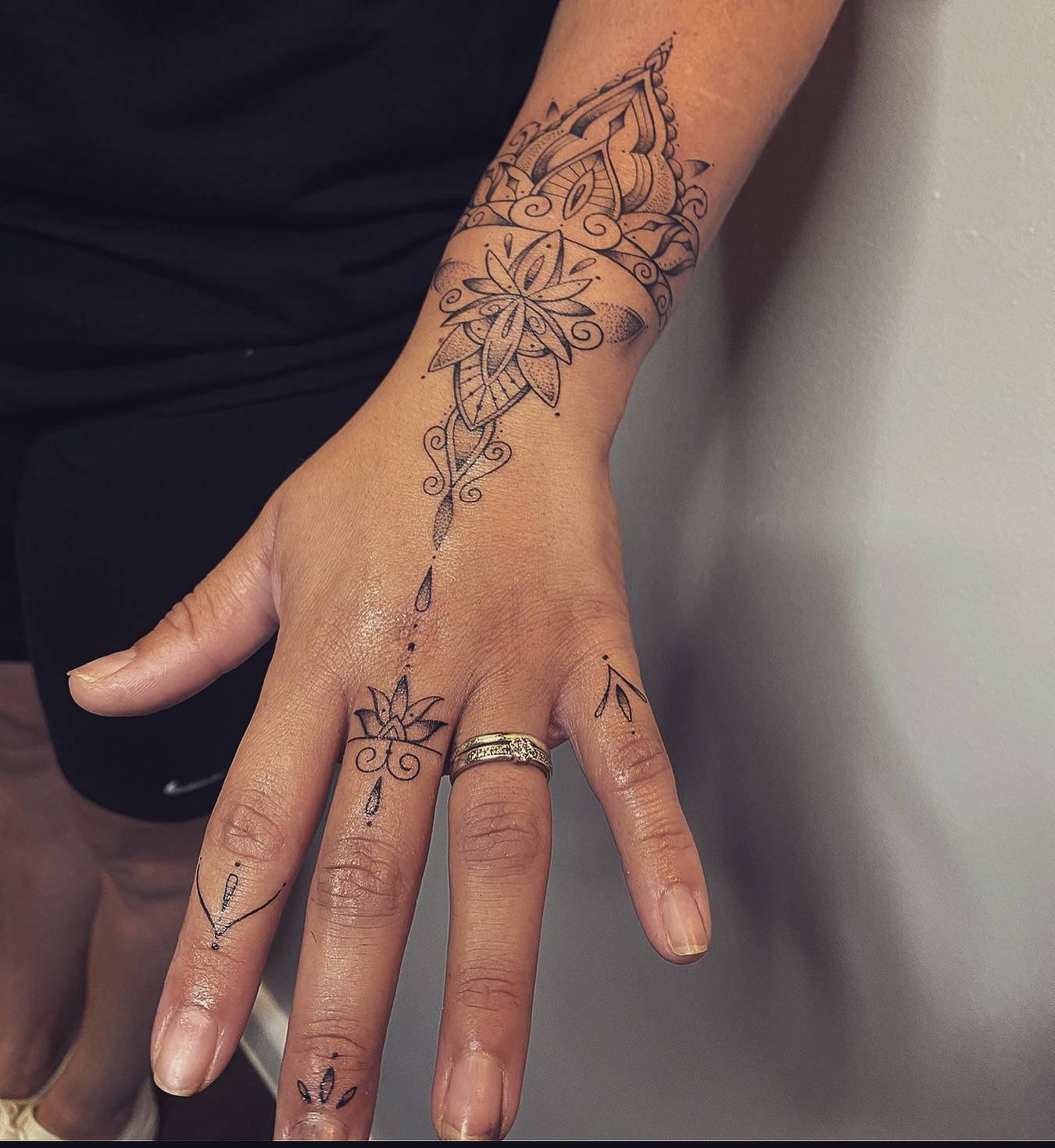 Freehand Wrist and Finger Tattoo