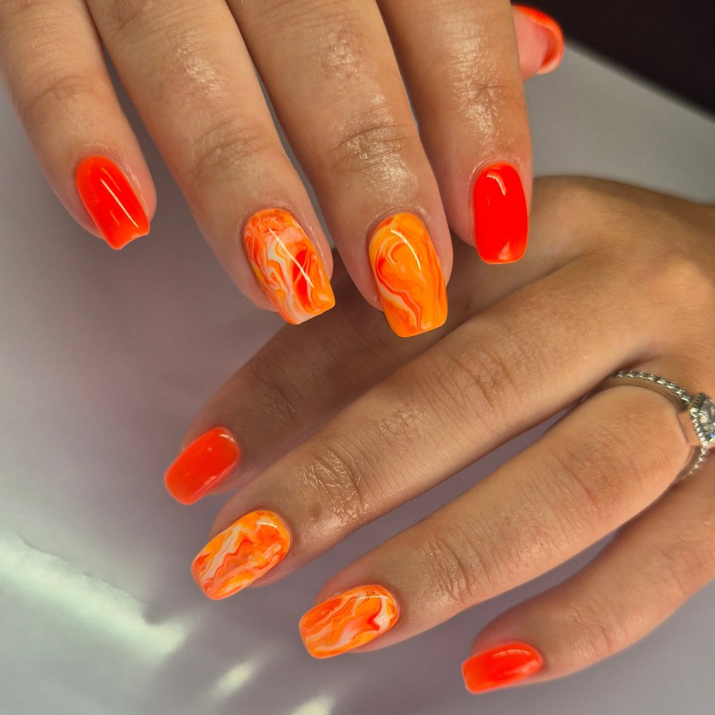 Marble Orange Chrome nails