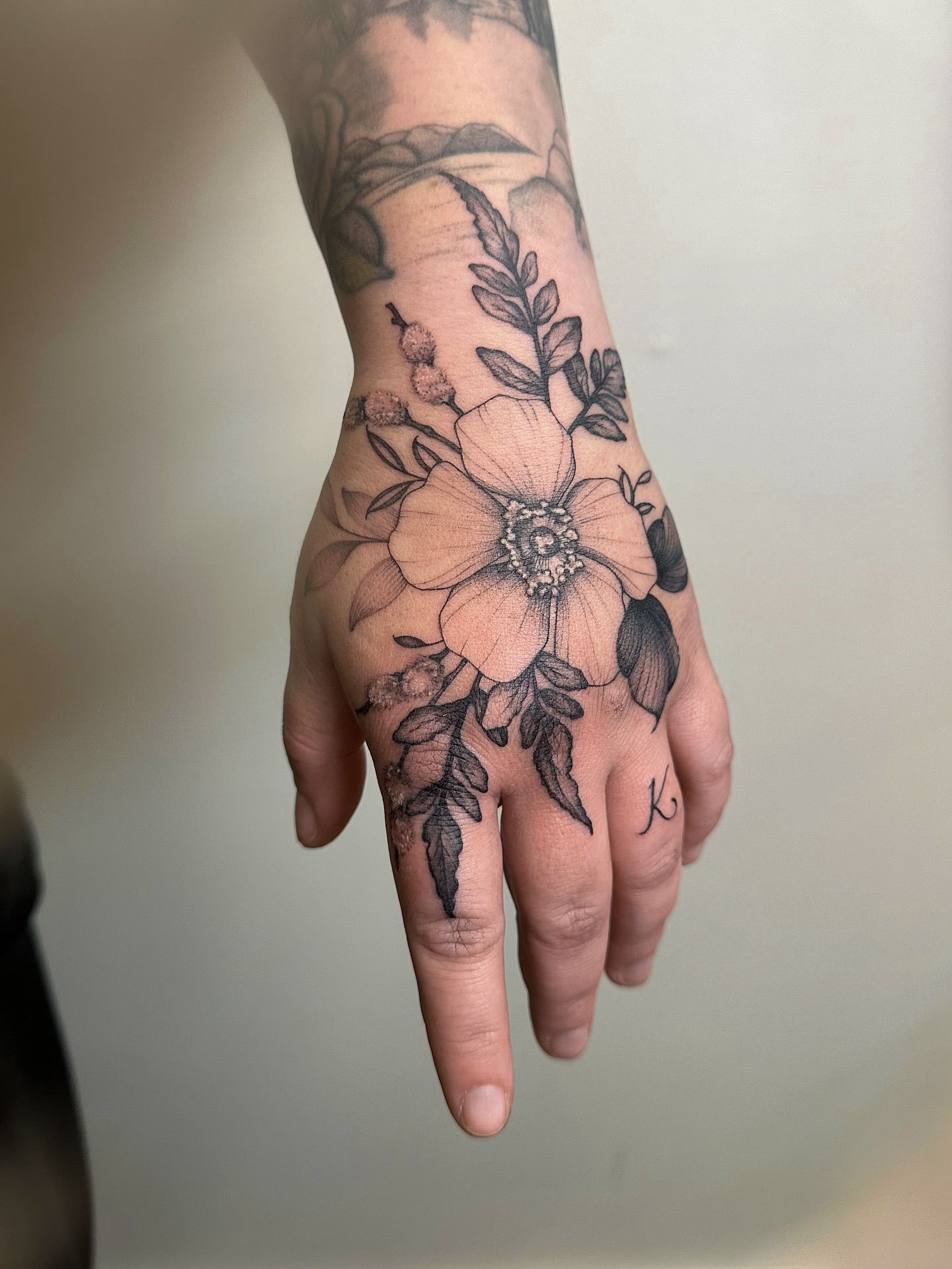 Flower Hand Tattoo
