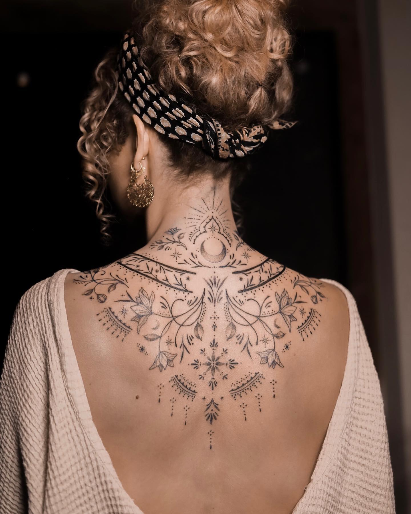 Ornament Spine Tattoo