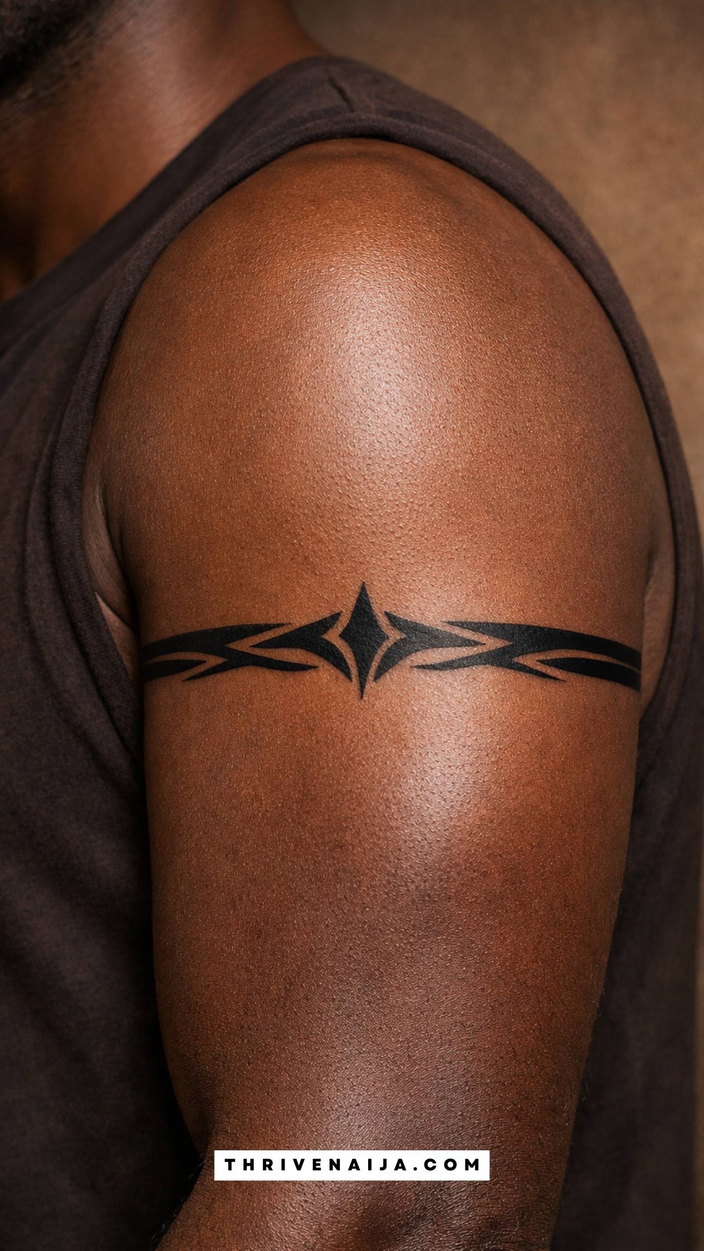 Minimal Tribal-Inspired Arm Band Tattoo