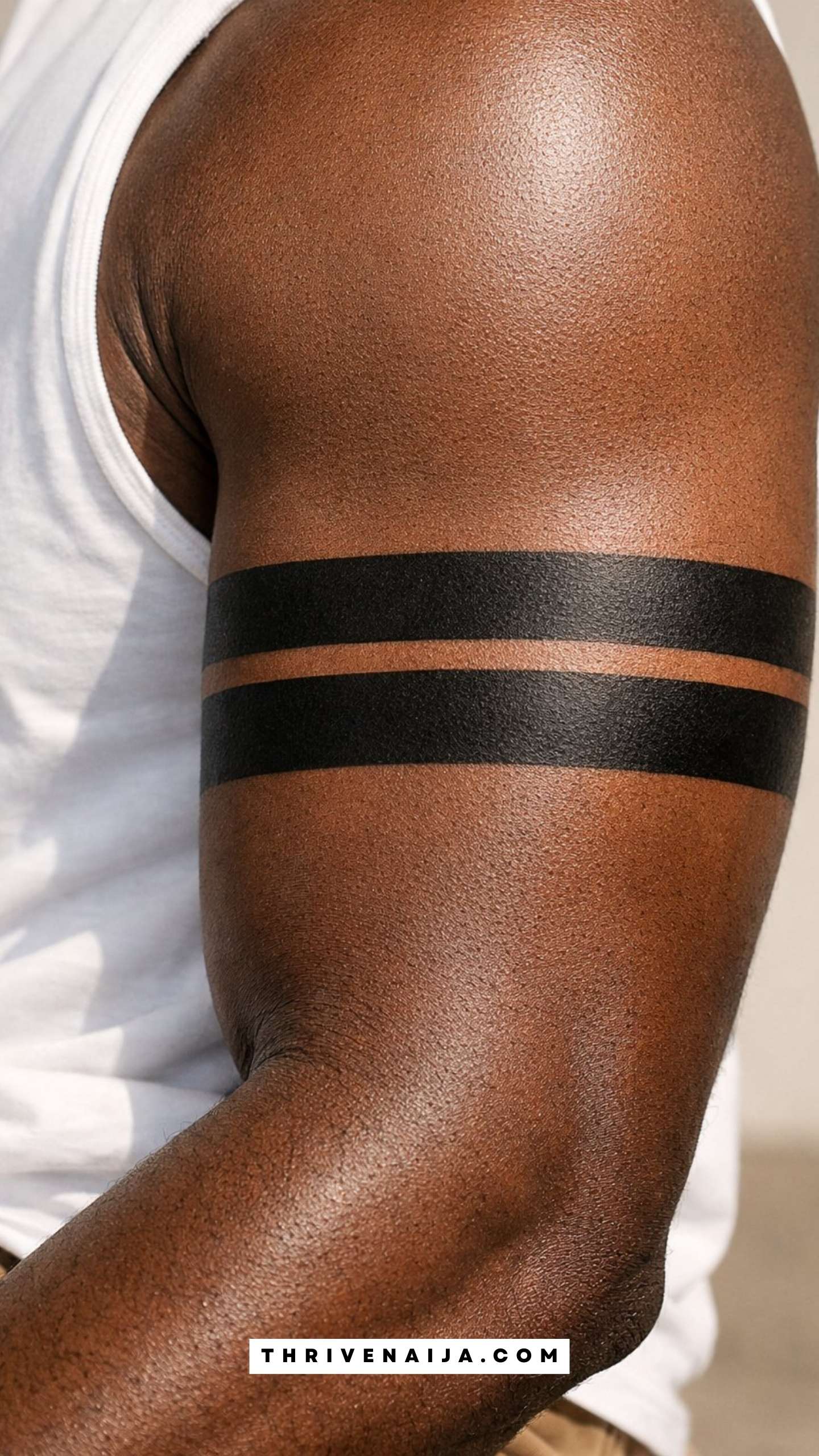 Negative Space Arm Band Tattoo