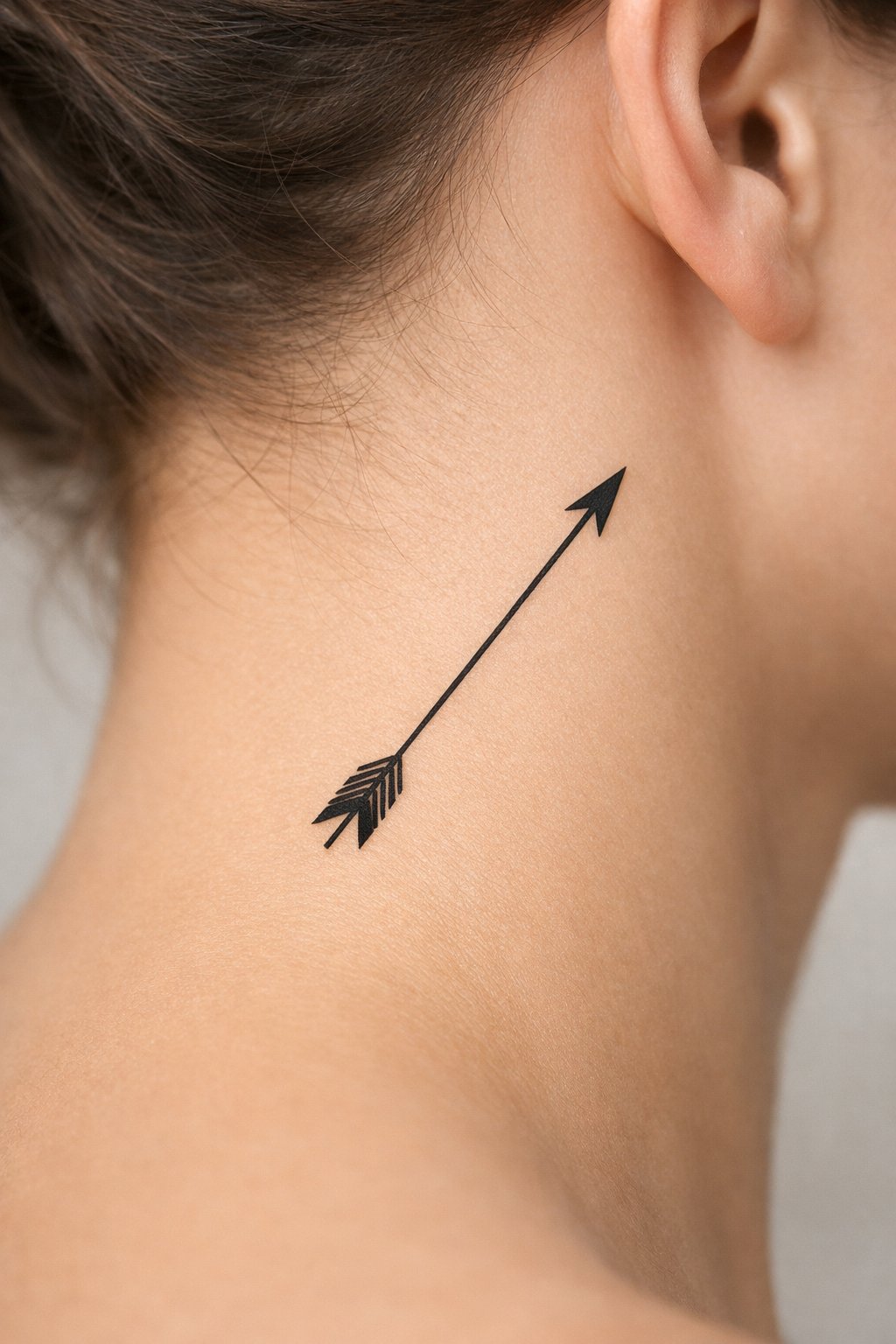 Diagonal placement on the side of the nape: a thin black arrow pointing upward toward the ear. The fletching (feathers) is minimally detailed.