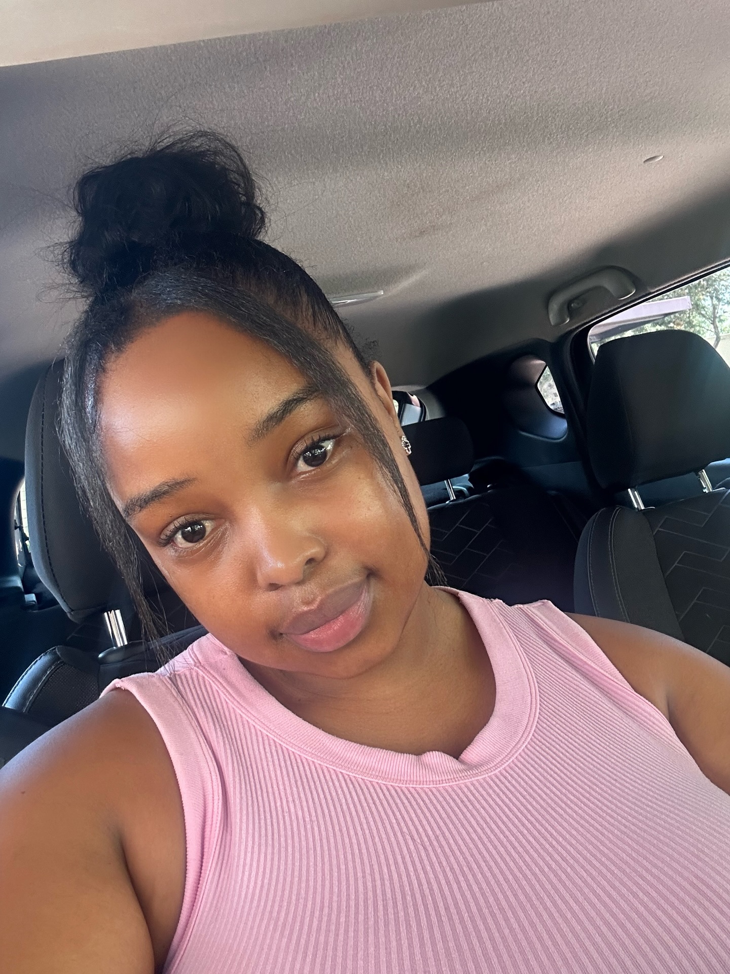 High Bun With Side Bangs