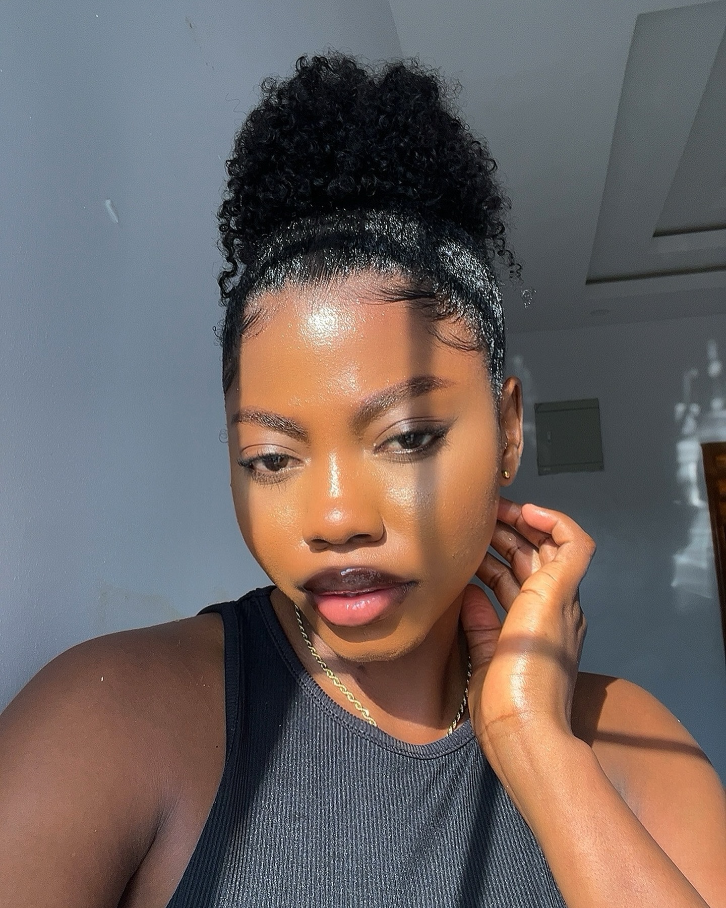 Sleek Medium Bun with Curls