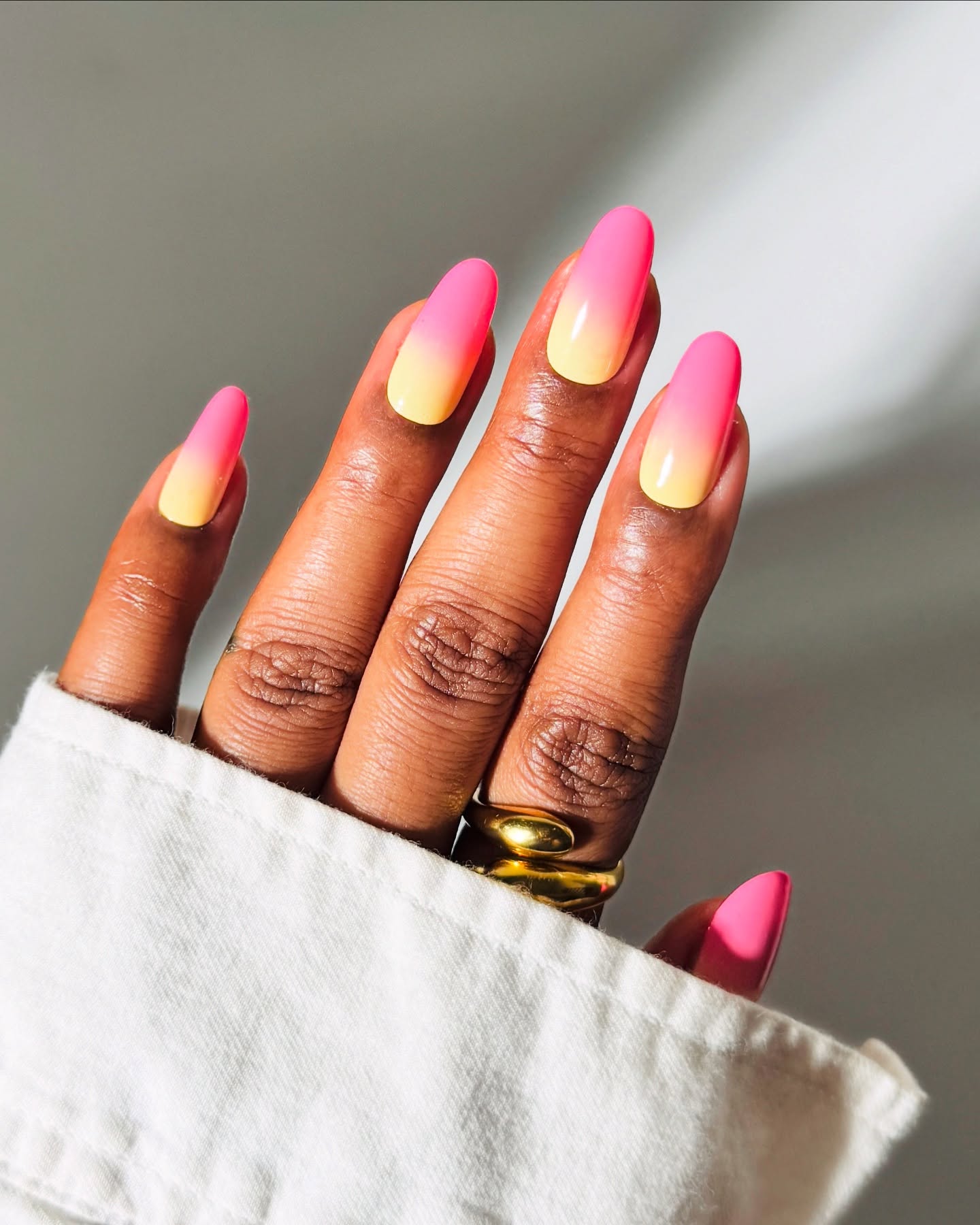 Gradient Pink and Yellow Nails