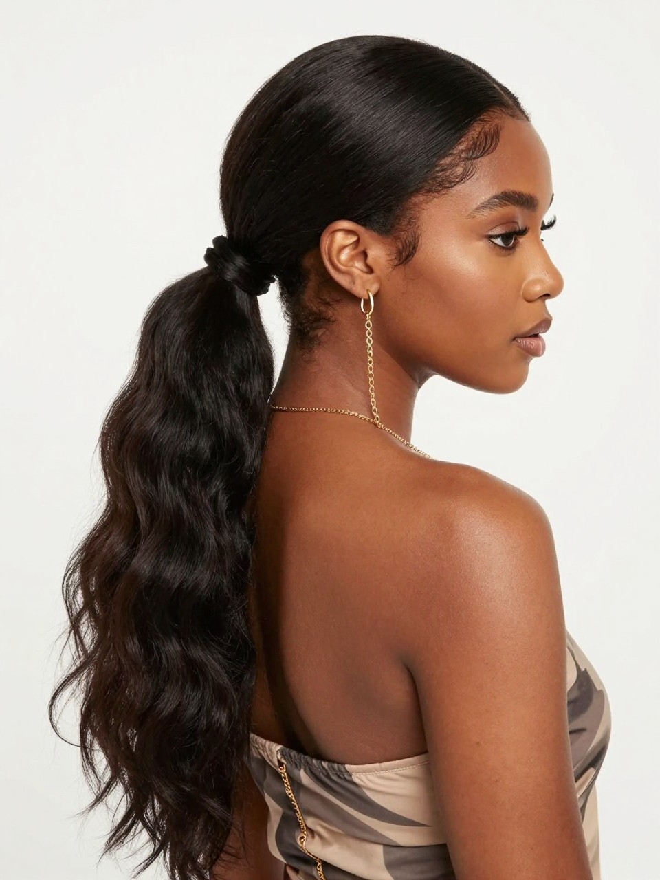 A photorealistic hairstyle image of a black woman in half-up bubble ponytail on long smooth hair, soft polished texture, sections of the ponytail gently rounded, a gold earring chain linking the ear to the first bubble section, youthful modern makeup, trendy dress, bright editorial background, stylish beauty photography, no text, no watermark, no watermarks on images.
