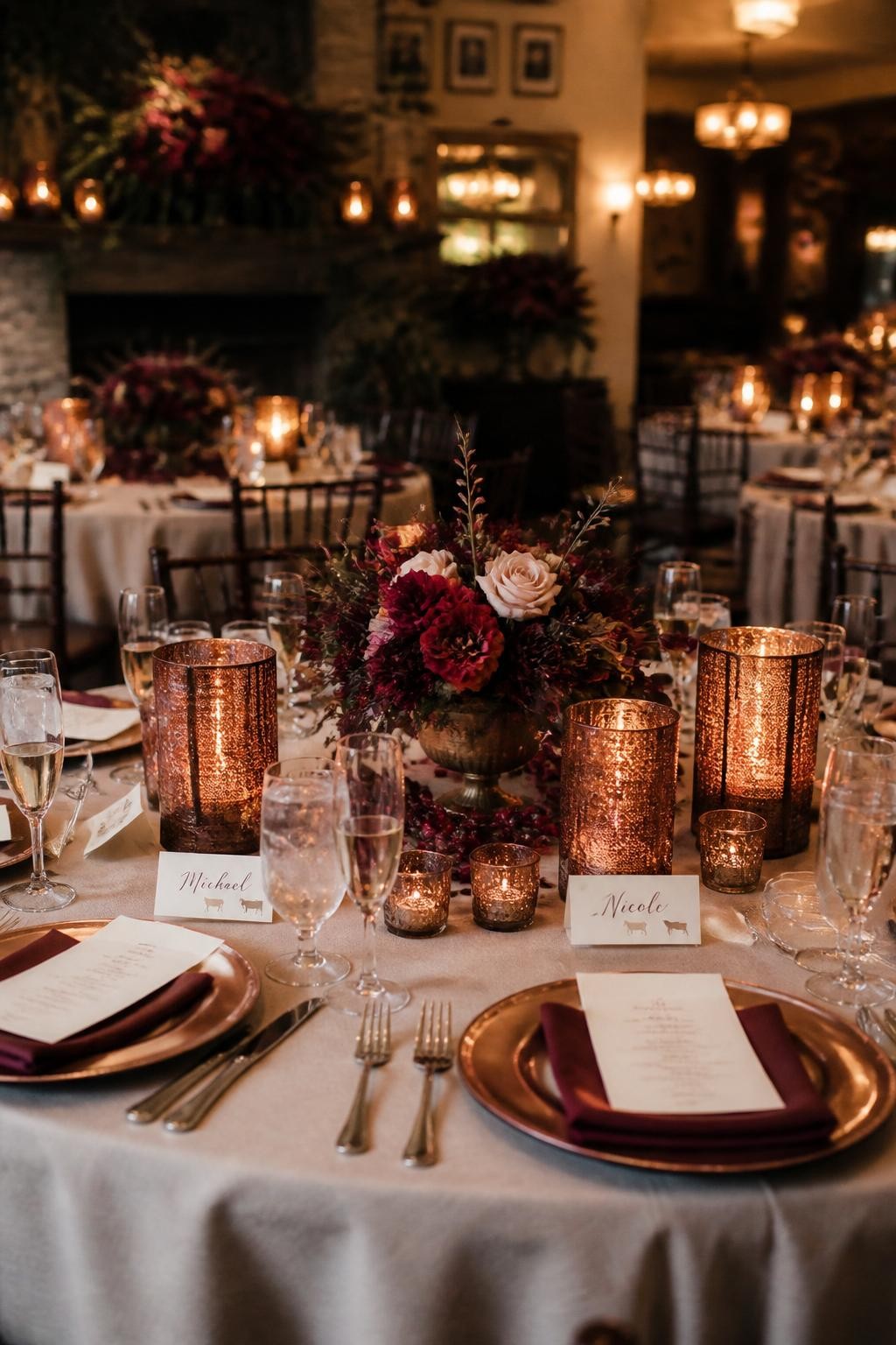 Realistic DSLR wedding reception photo with cranberry red floral arrangements, copper candle holders, oatmeal linen tablecloths, rosewood chairs, dark red berries, warm amber lighting, handwritten place cards, fall wedding dinner setup inside a cozy restaurant venue.