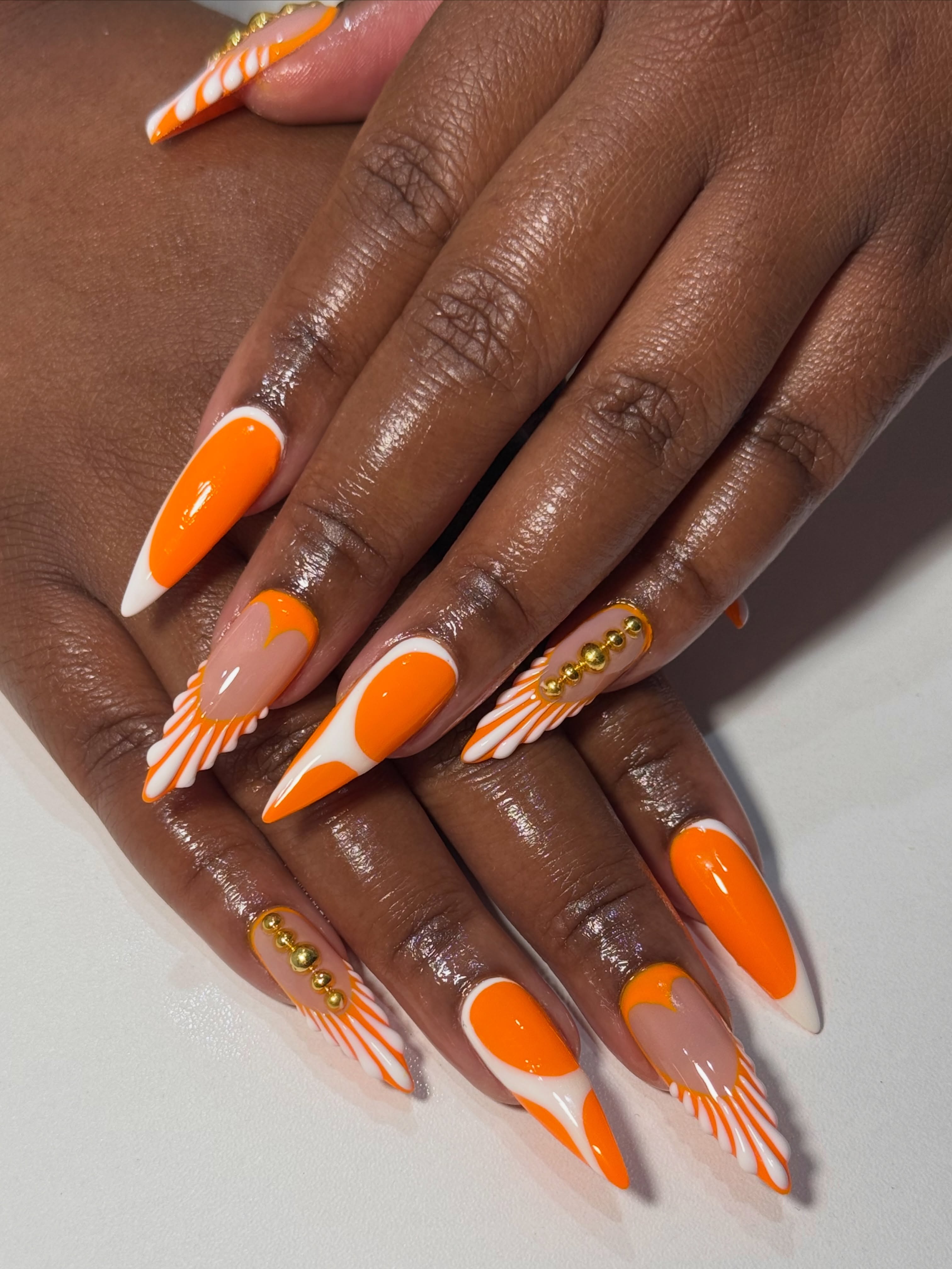 Acrylic Orange Nails With White Accent
