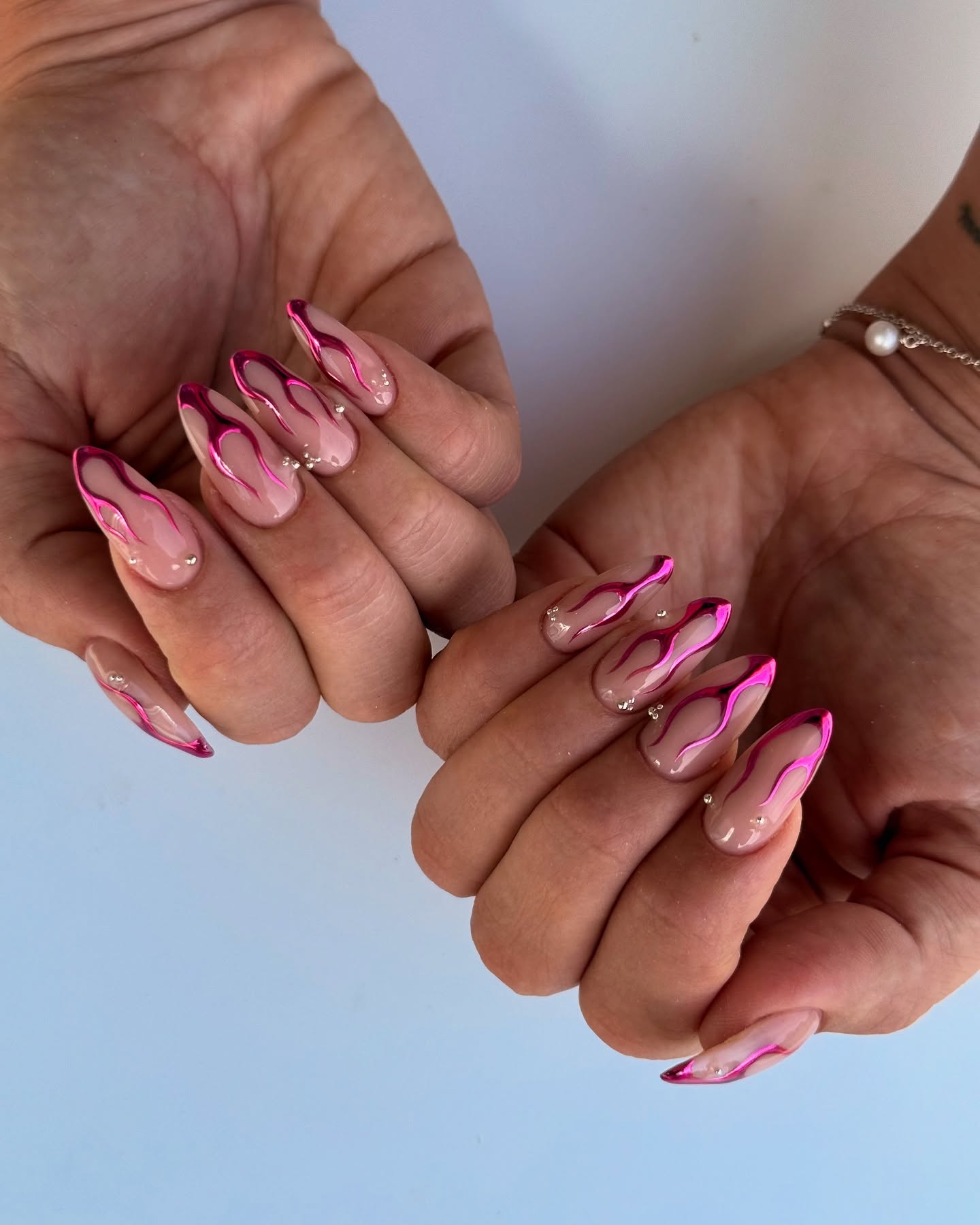 Nude Nails with Pink Chrome Flames and Silver Accents