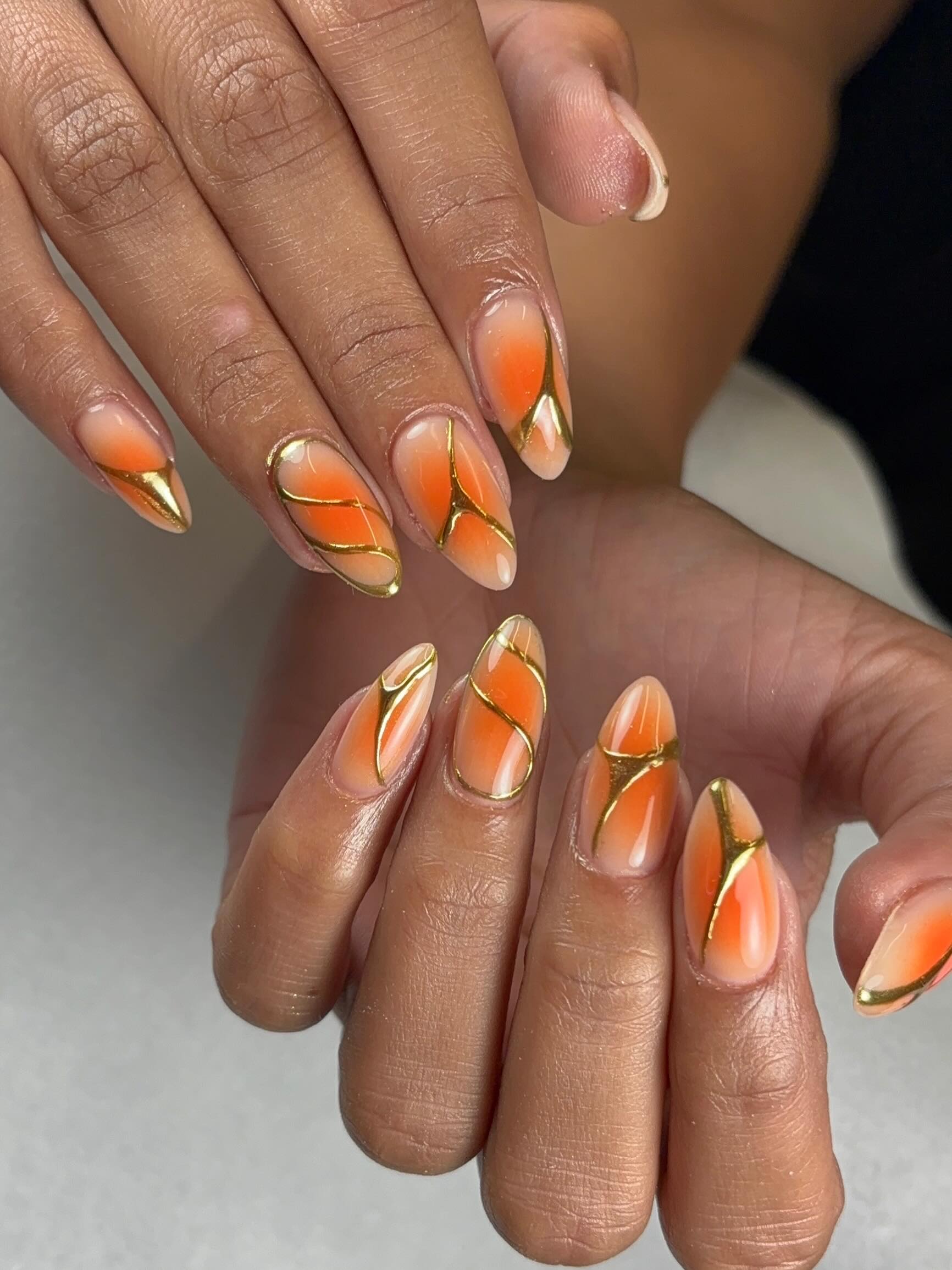 Orange Gel Nails with Gold Details