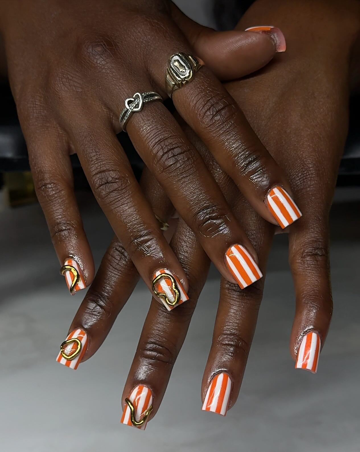 Orange and White Stripe Nails with Gold Detail