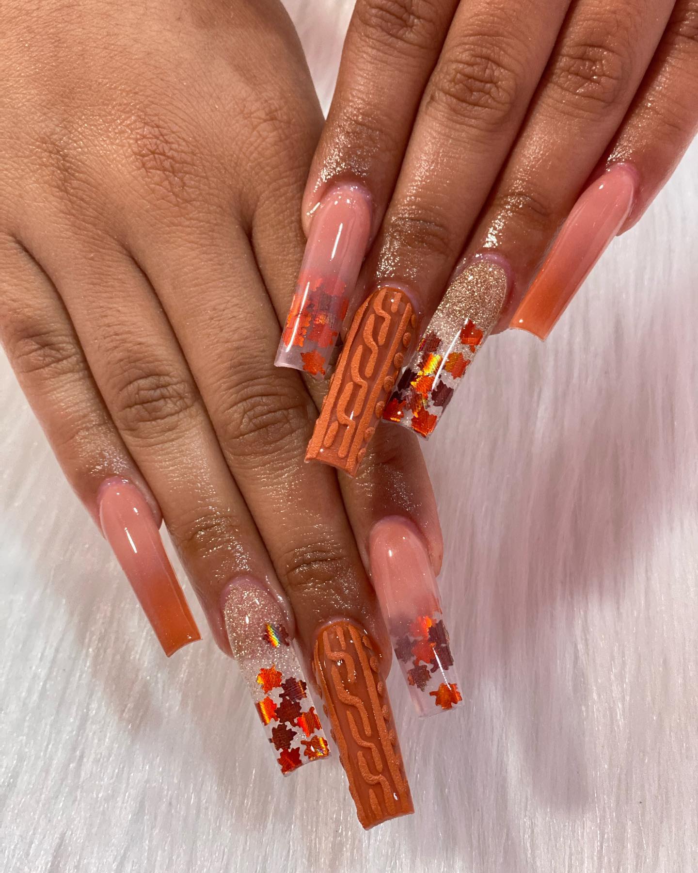 Soft Orange Acrylic Nails With Fall Leaves
