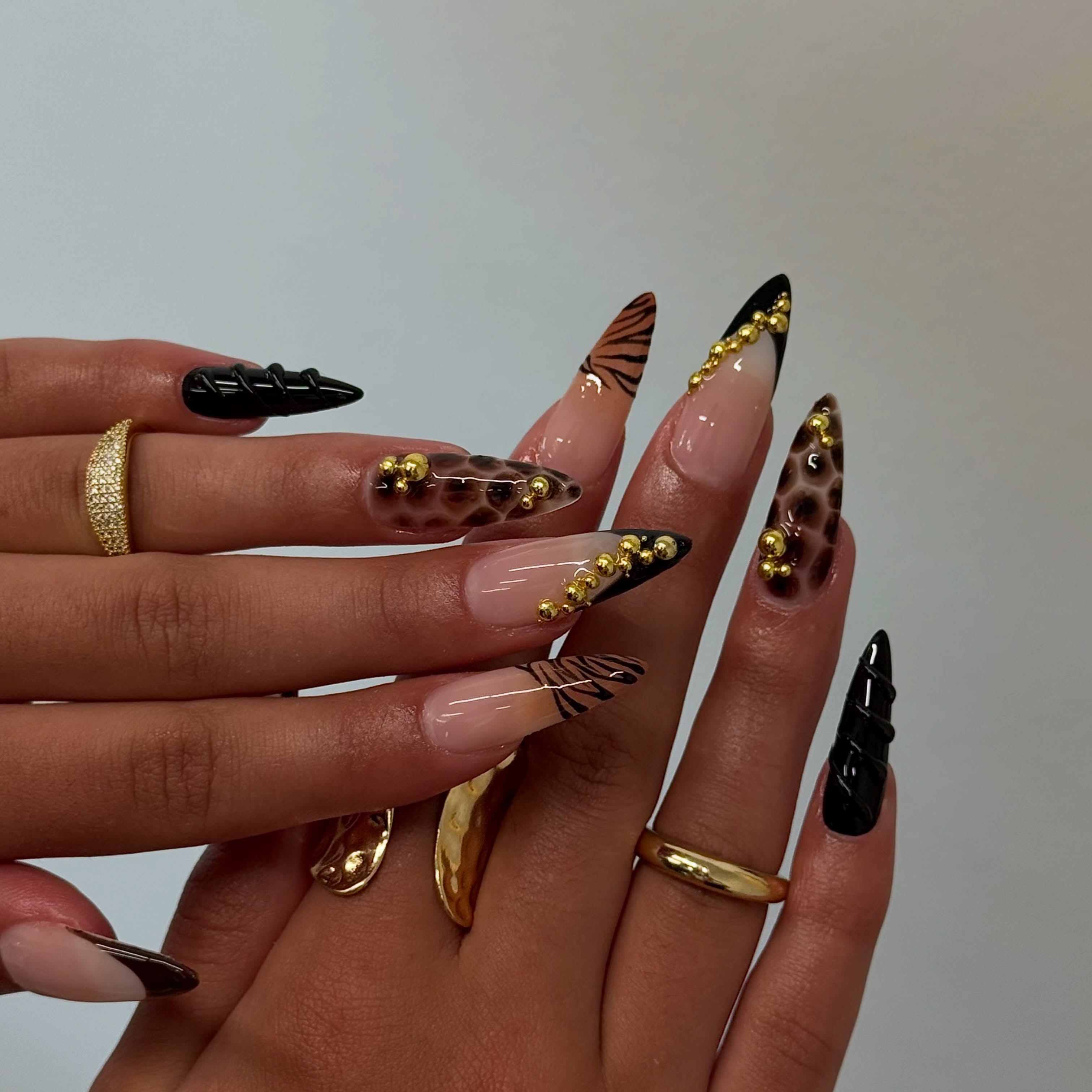 Tortie Stiletto French Nails with Gold Accent