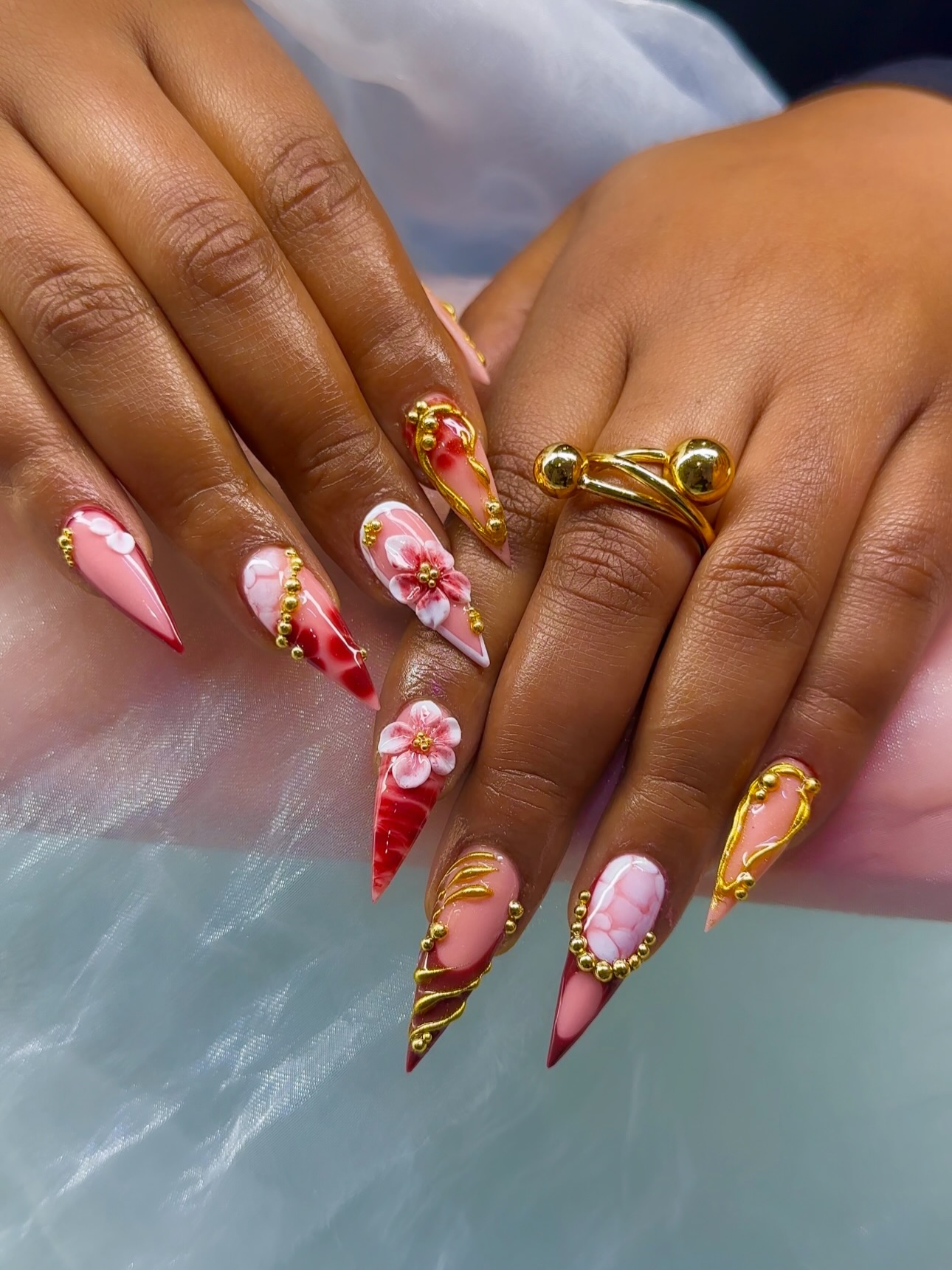 Burgundy Red Stiletto Nails with Gold Details