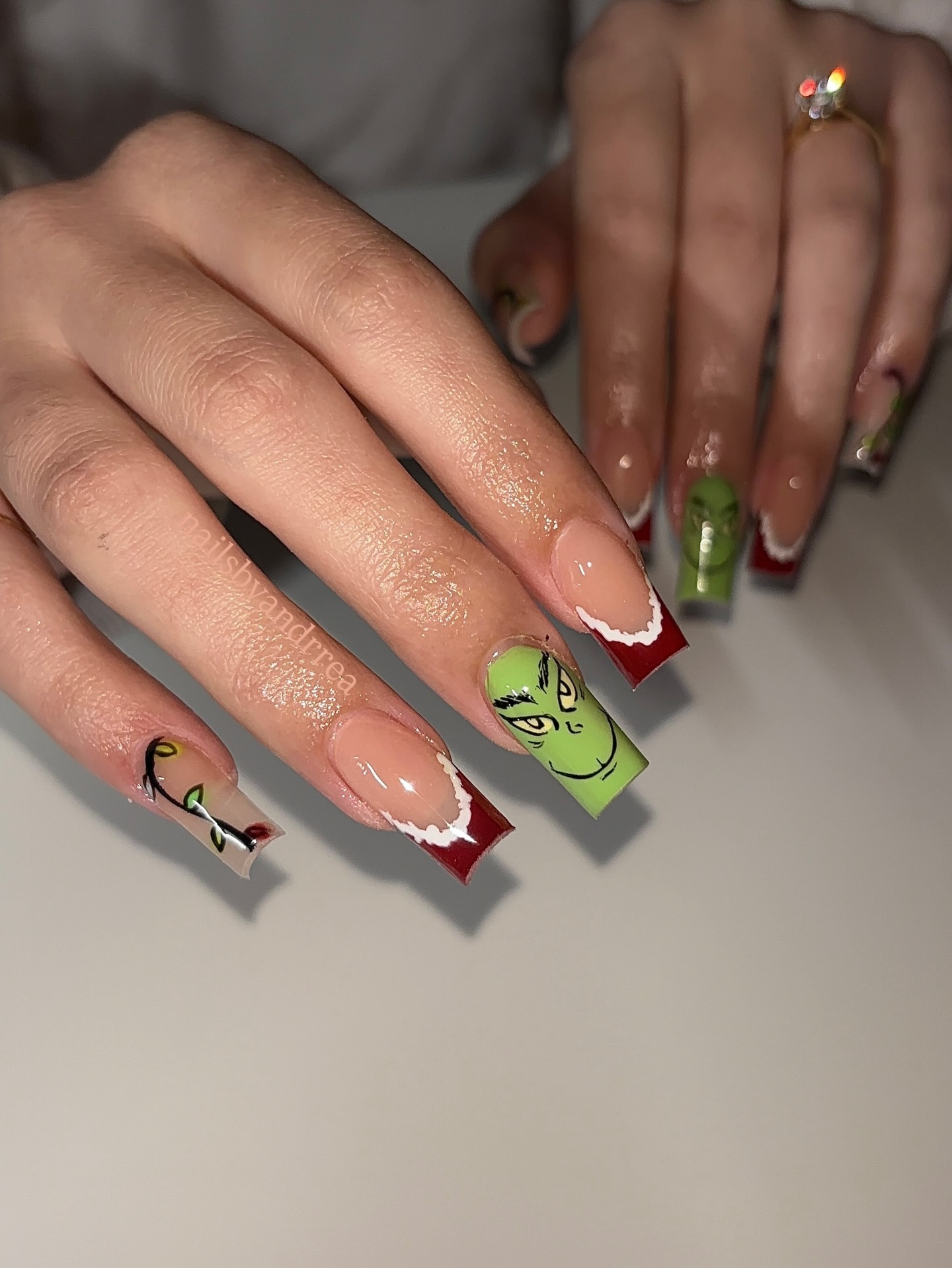Smiley Grinch Paired with Red French Tips